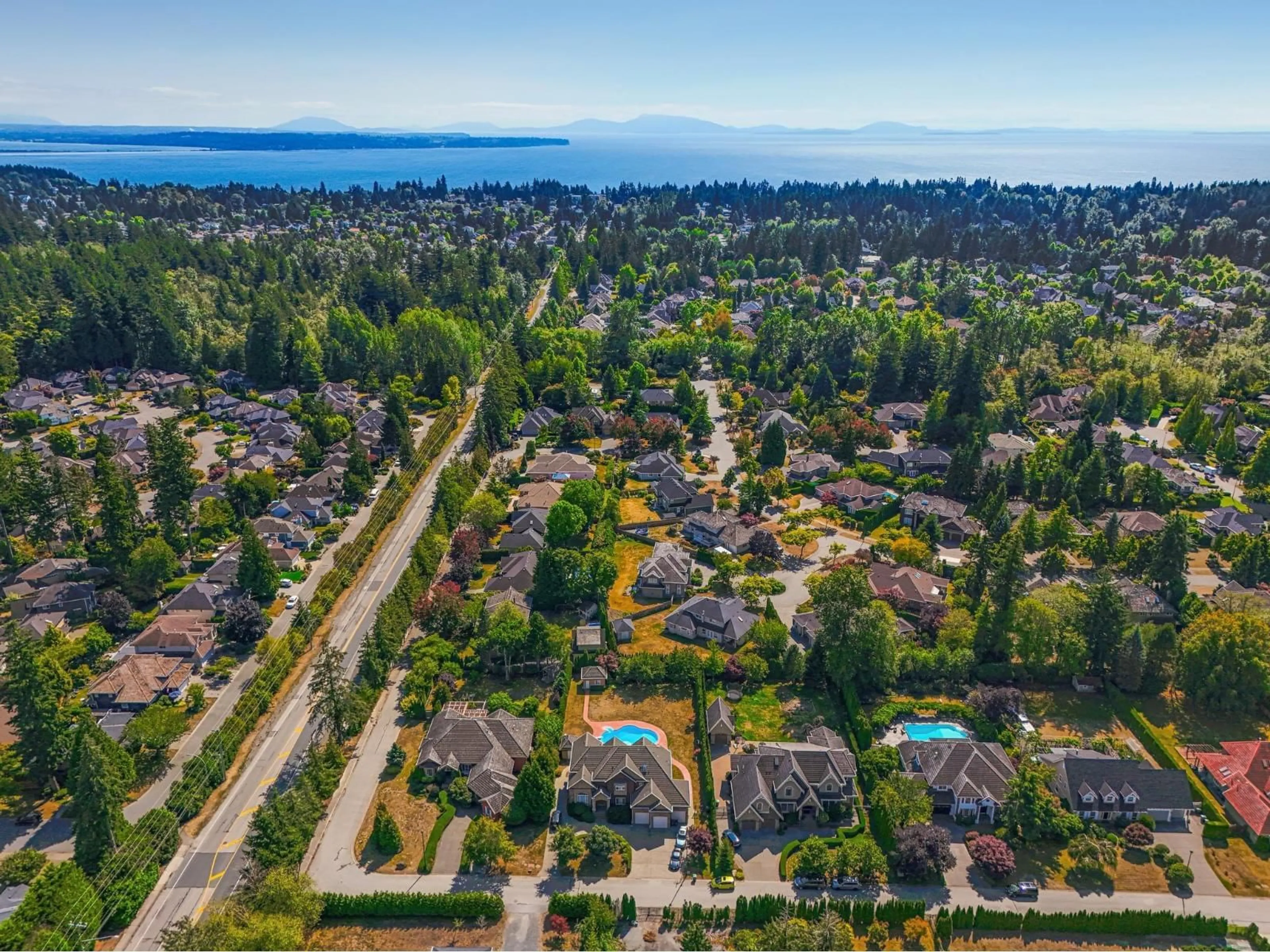 A pic from outside/outdoor area/front of a property/back of a property/a pic from drone, water/lake/river/ocean view for 13978 23A AVENUE, Surrey British Columbia V4A9V9