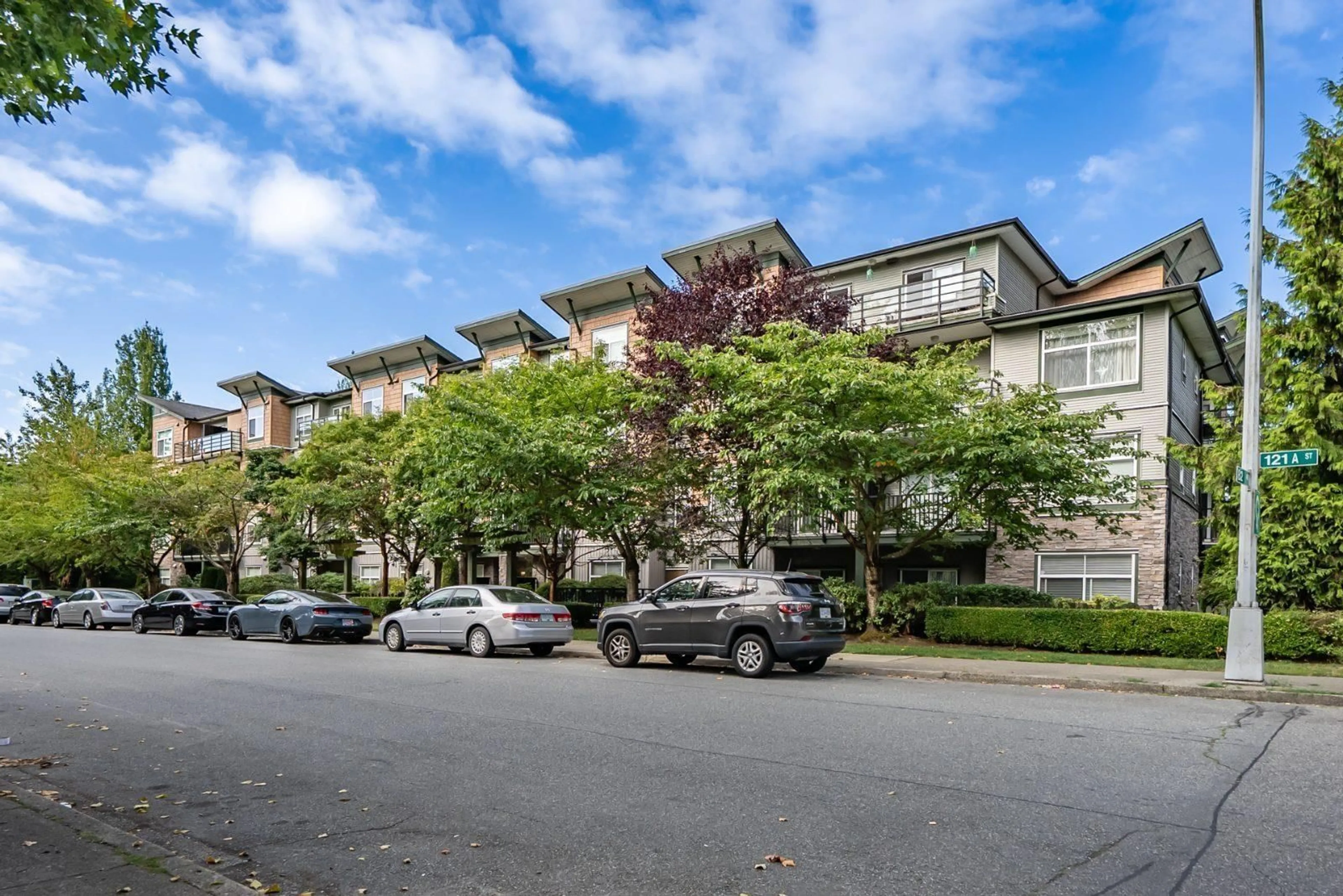 A pic from outside/outdoor area/front of a property/back of a property/a pic from drone, unknown for 305 - 8183 121A STREET, Surrey British Columbia V3W1S7