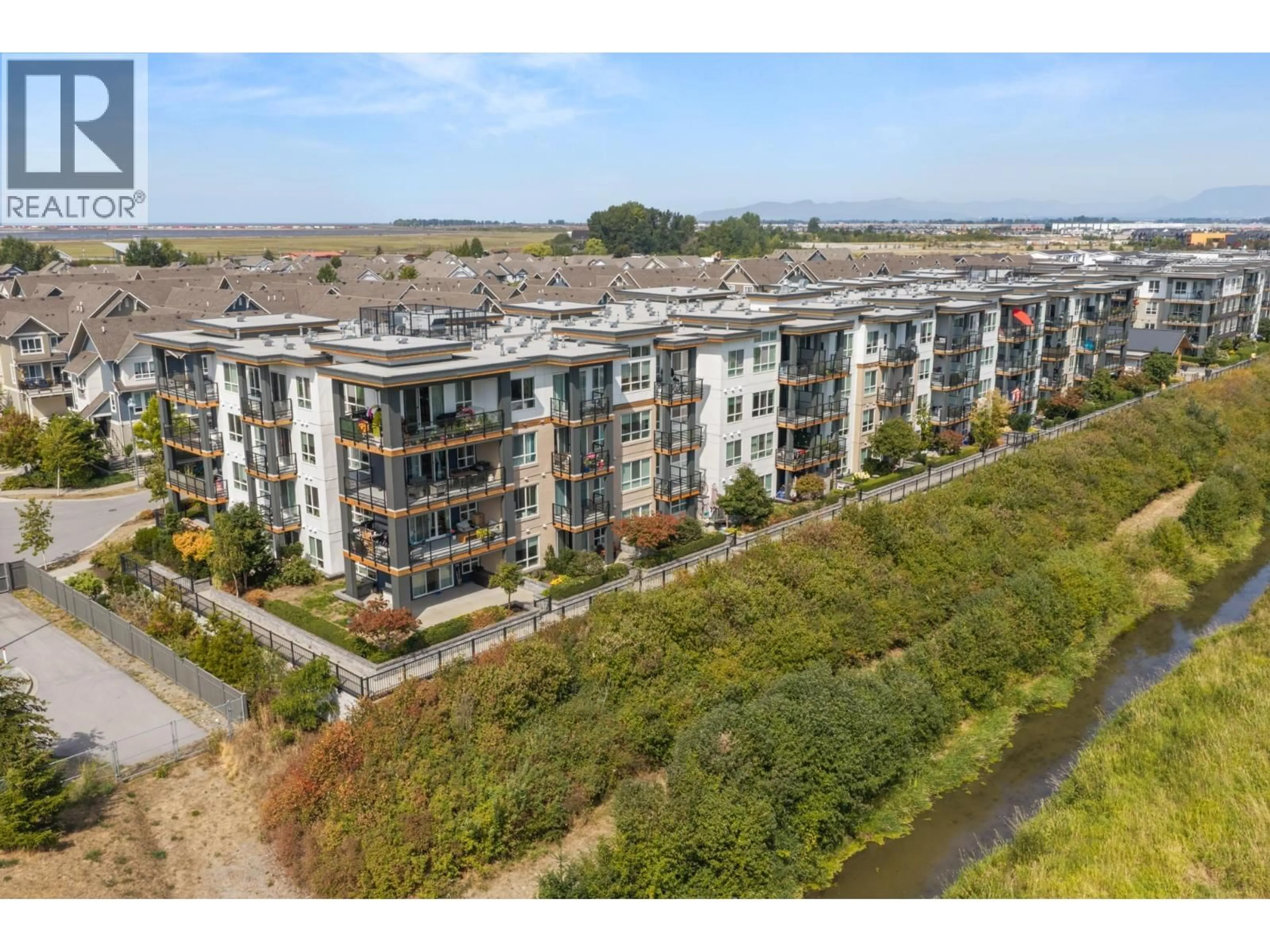 A pic from outside/outdoor area/front of a property/back of a property/a pic from drone, water/lake/river/ocean view for 203 - 1792 STARLING DRIVE, Tsawwassen British Columbia V4M0E4