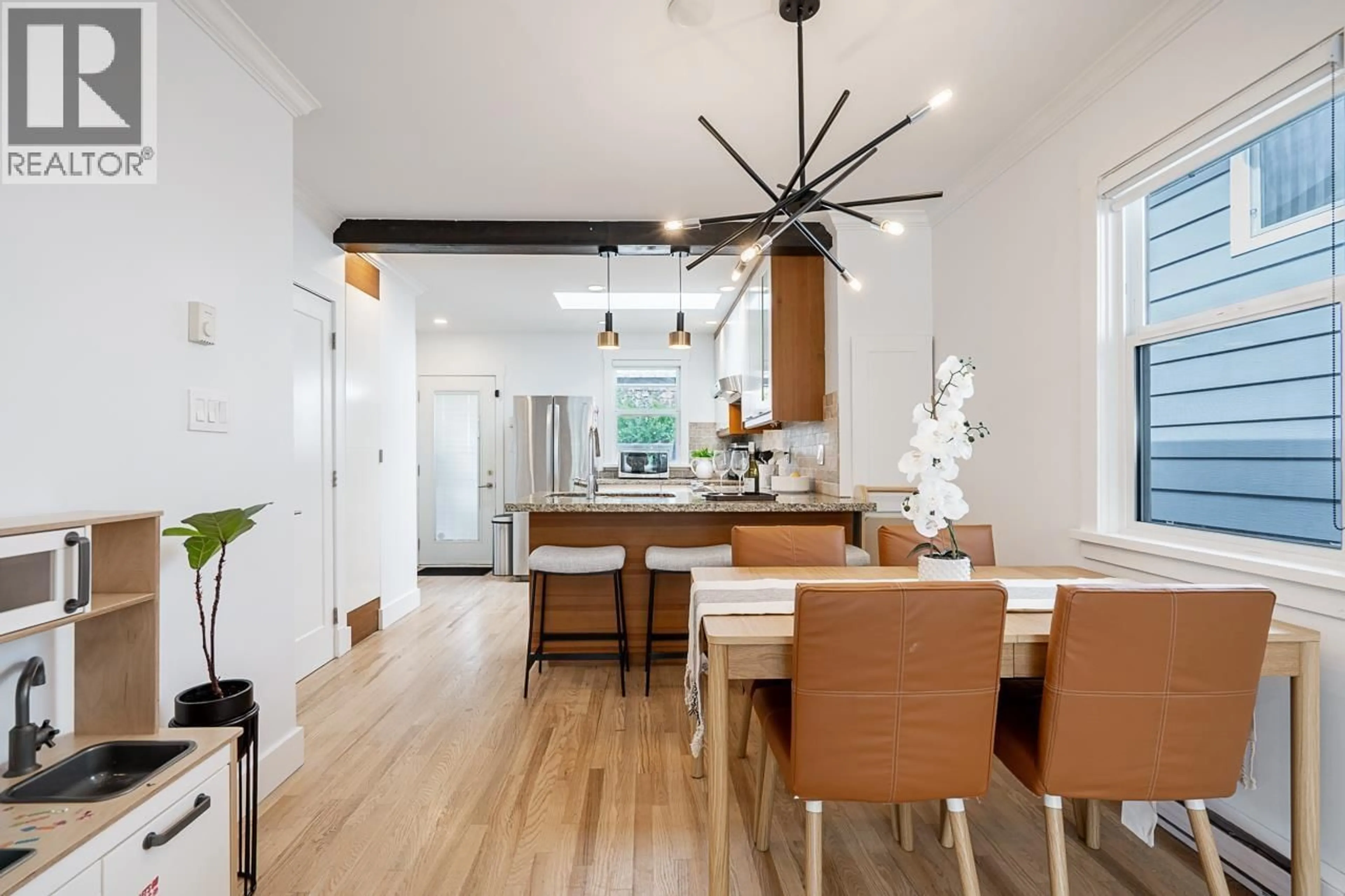 Open concept kitchen, wood/laminate floor for 1617 36TH AVENUE, Vancouver British Columbia V5P1C3