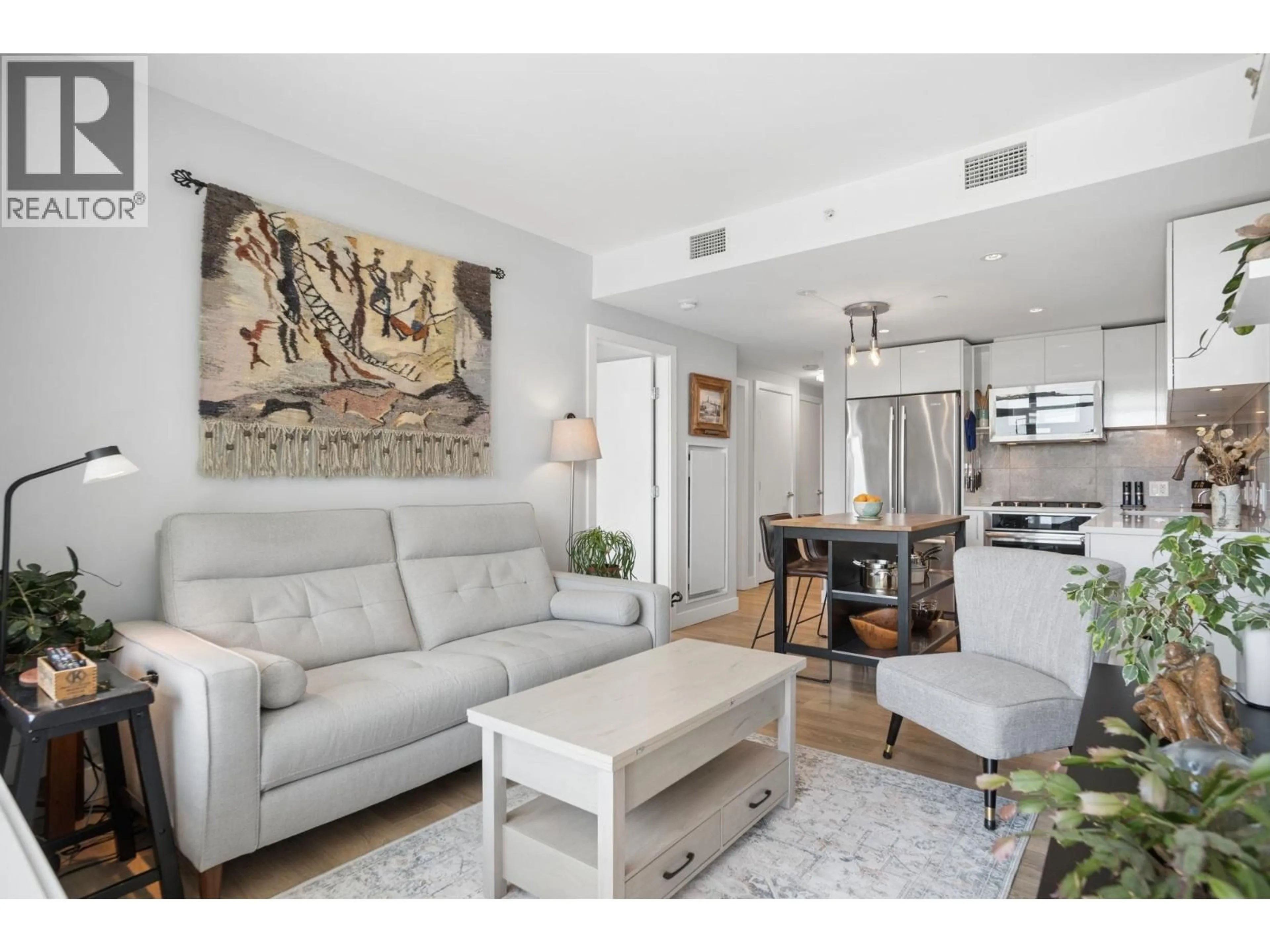 Living room with furniture, unknown for 607 - 8538 RIVER DISTRICT CROSSING, Vancouver British Columbia V5S0C9