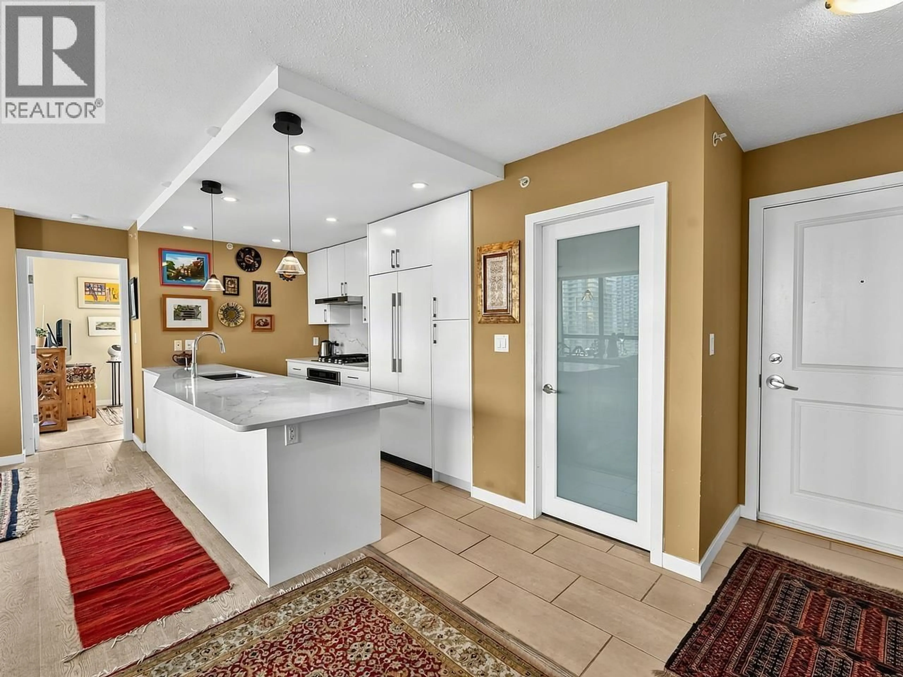 Open concept kitchen, ceramic/tile floor for 2102 - 4333 CENTRAL BOULEVARD, Burnaby British Columbia V5H4W8
