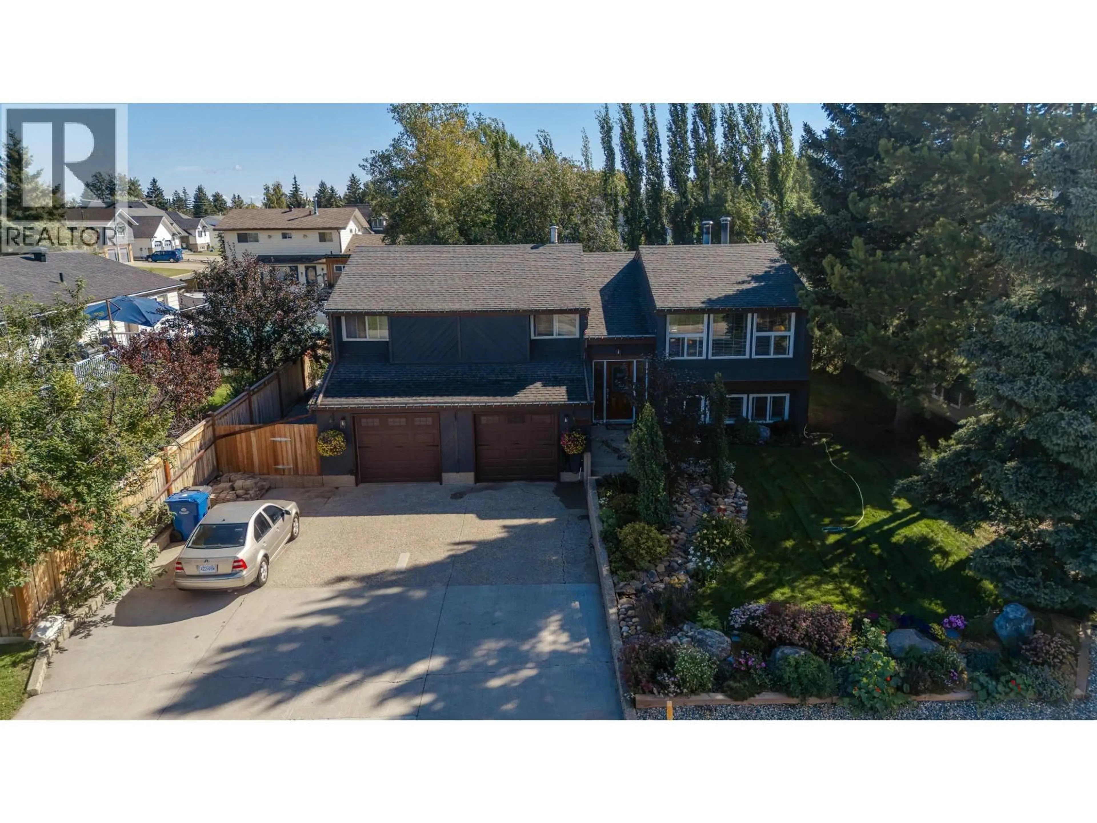 A pic from outside/outdoor area/front of a property/back of a property/a pic from drone, street for 10707 108 STREET, Fort St. John British Columbia V1J5N9