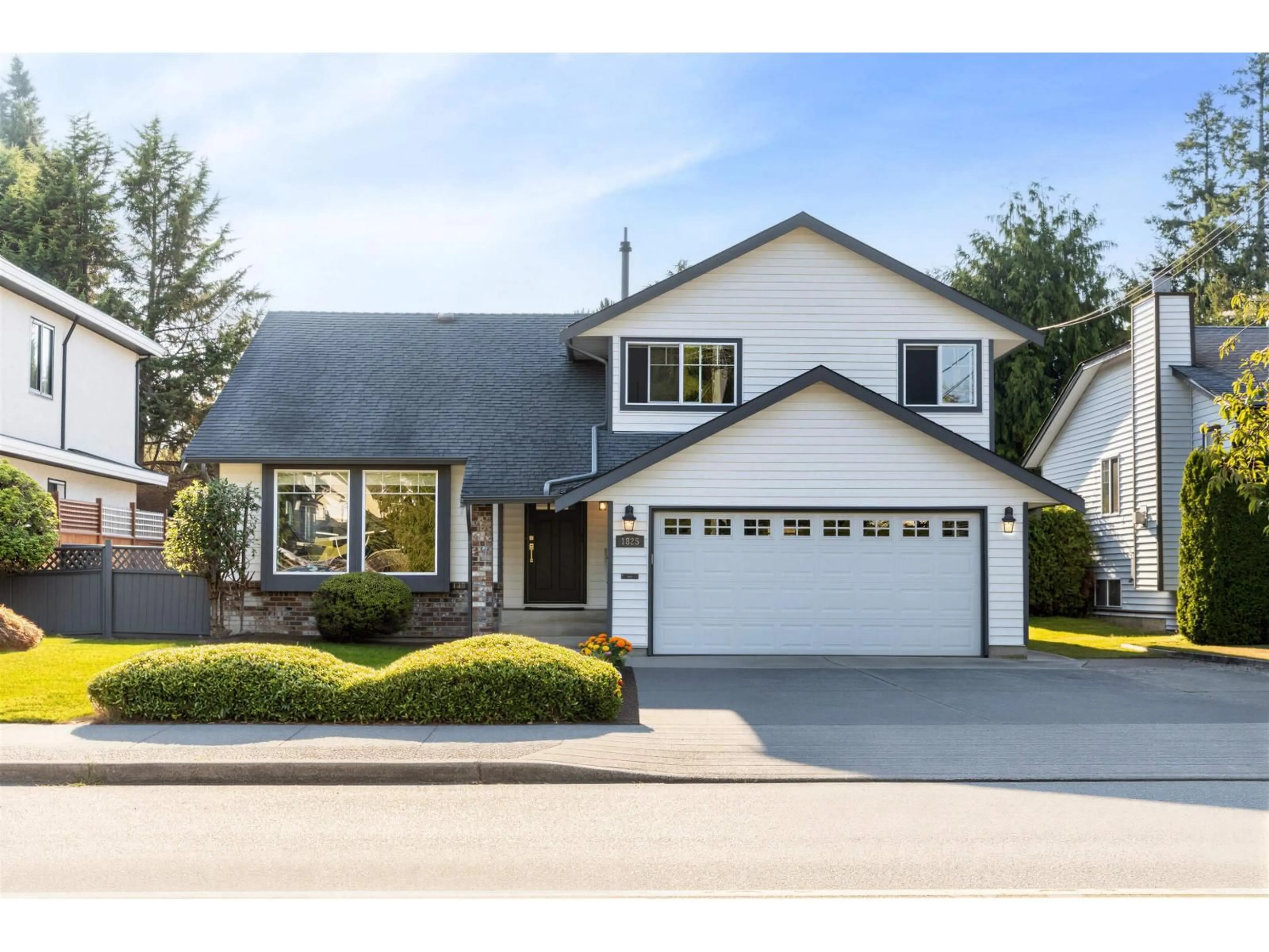 Home with vinyl exterior material, street for 1825 144 STREET, Surrey British Columbia V4A7E8