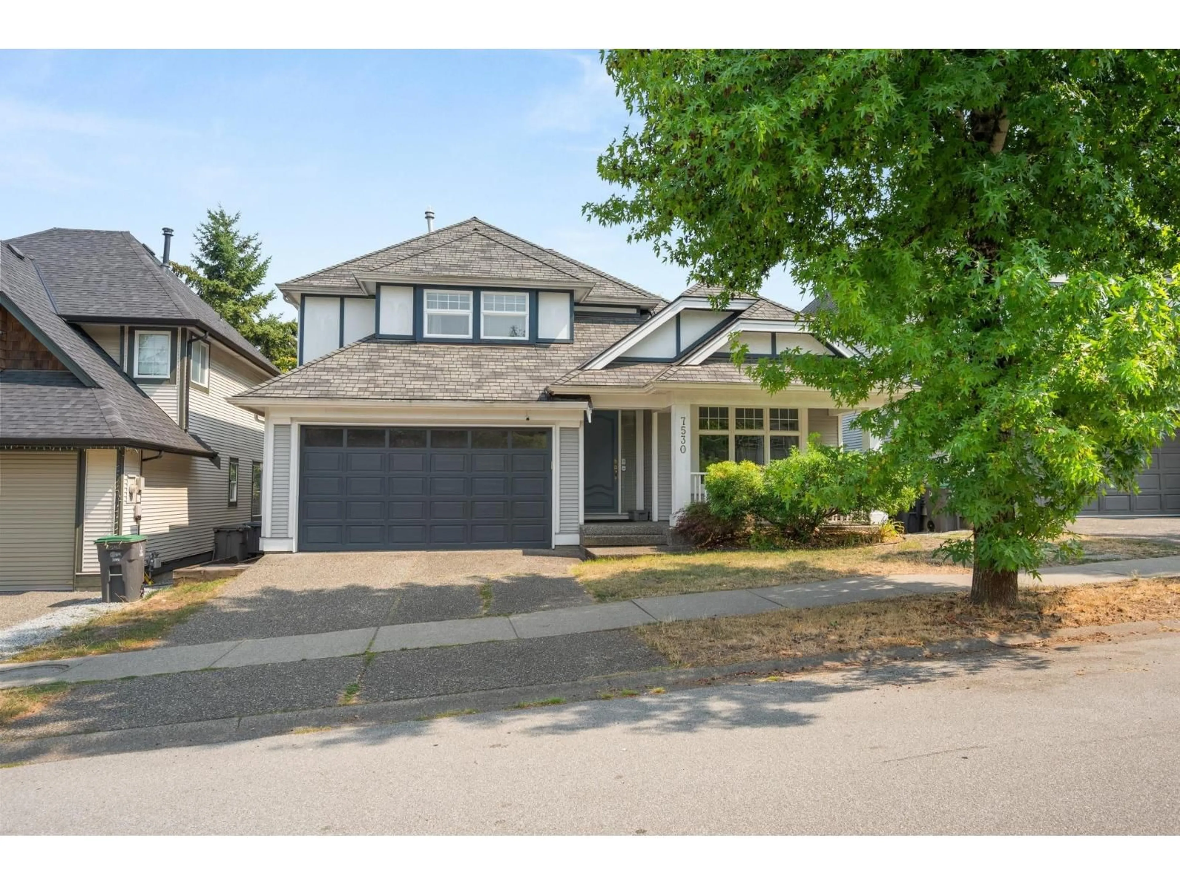 Home with vinyl exterior material, street for 7530 146 STREET, Surrey British Columbia V3S8T9