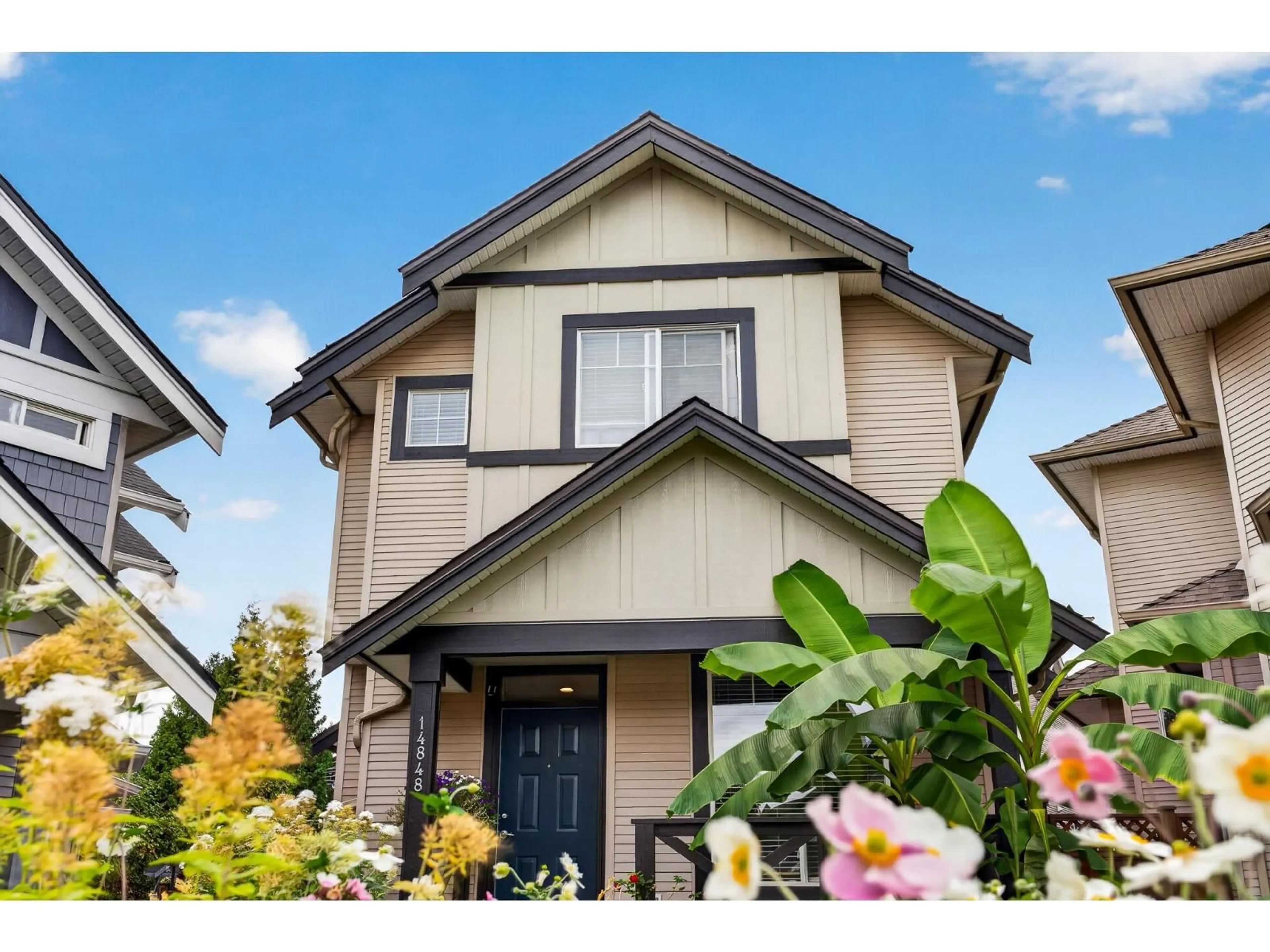 Home with vinyl exterior material, street for 14848 56A AVENUE, Surrey British Columbia V3S8X1