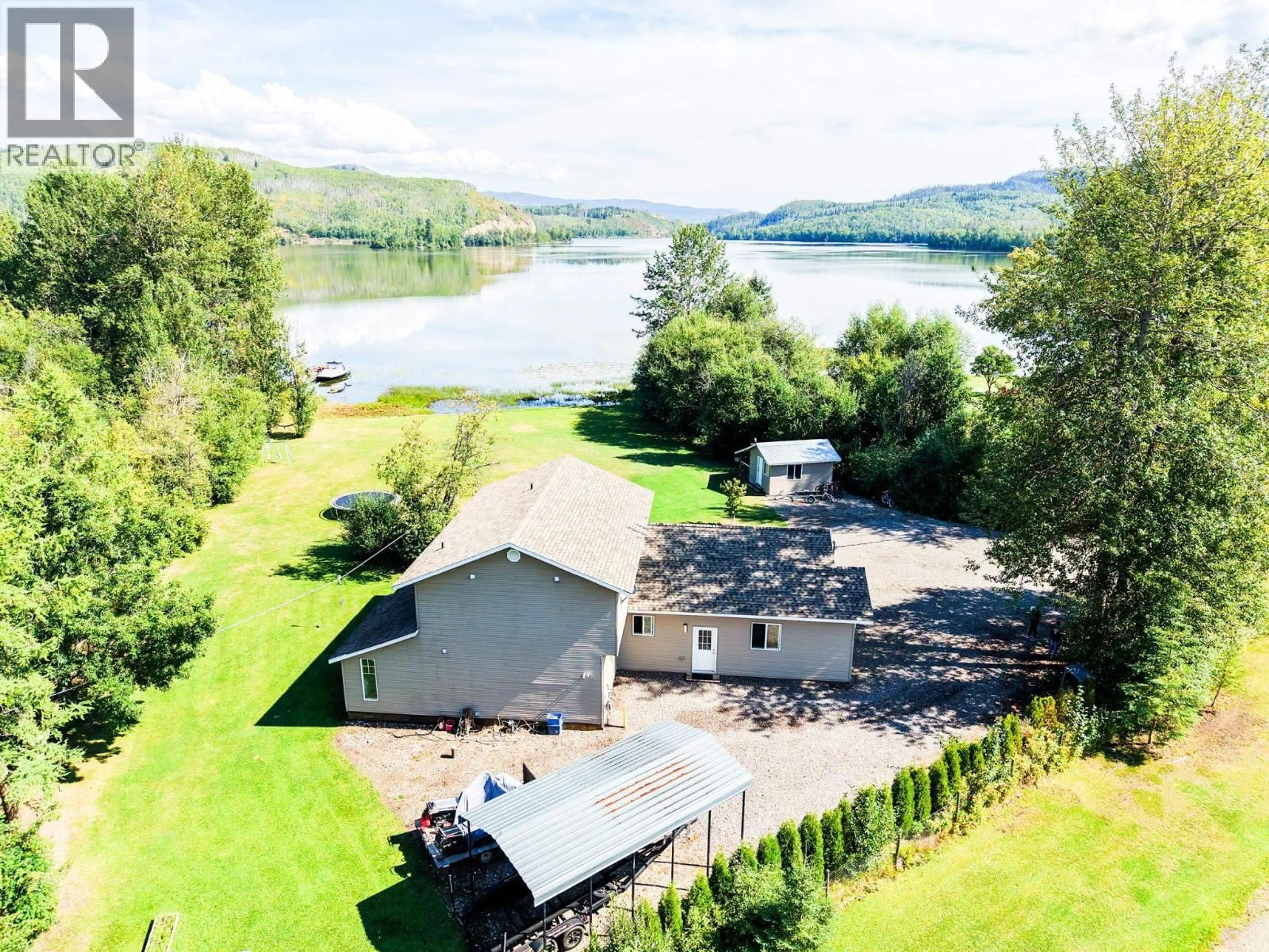 A pic from outside/outdoor area/front of a property/back of a property/a pic from drone, water/lake/river/ocean view for 770 NOURSE SUB 2 ROAD, Burns Lake British Columbia V0J1E2