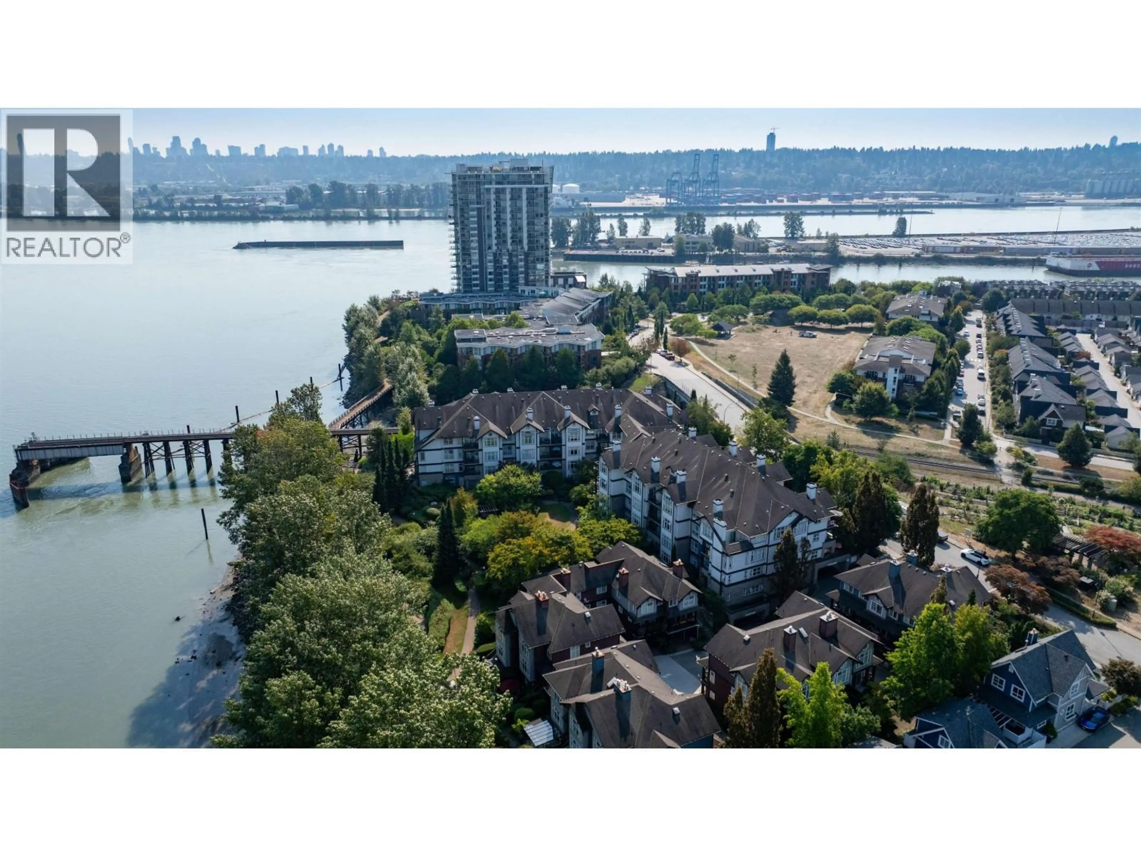 A pic from outside/outdoor area/front of a property/back of a property/a pic from drone, water/lake/river/ocean view for 317 - 83 STAR CRESCENT, New Westminster British Columbia V3M6X8