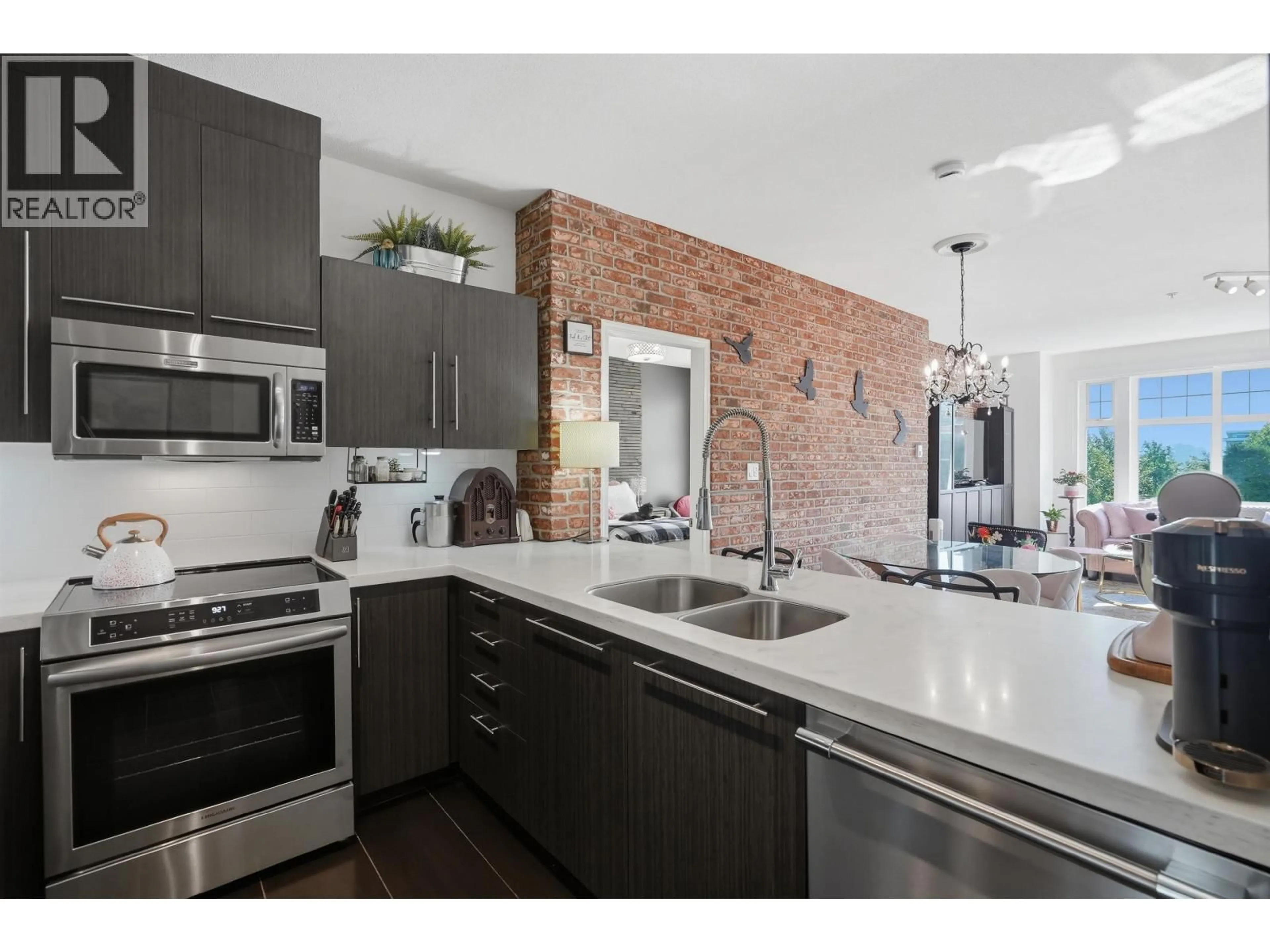 Open concept kitchen, unknown for 317 - 83 STAR CRESCENT, New Westminster British Columbia V3M6X8
