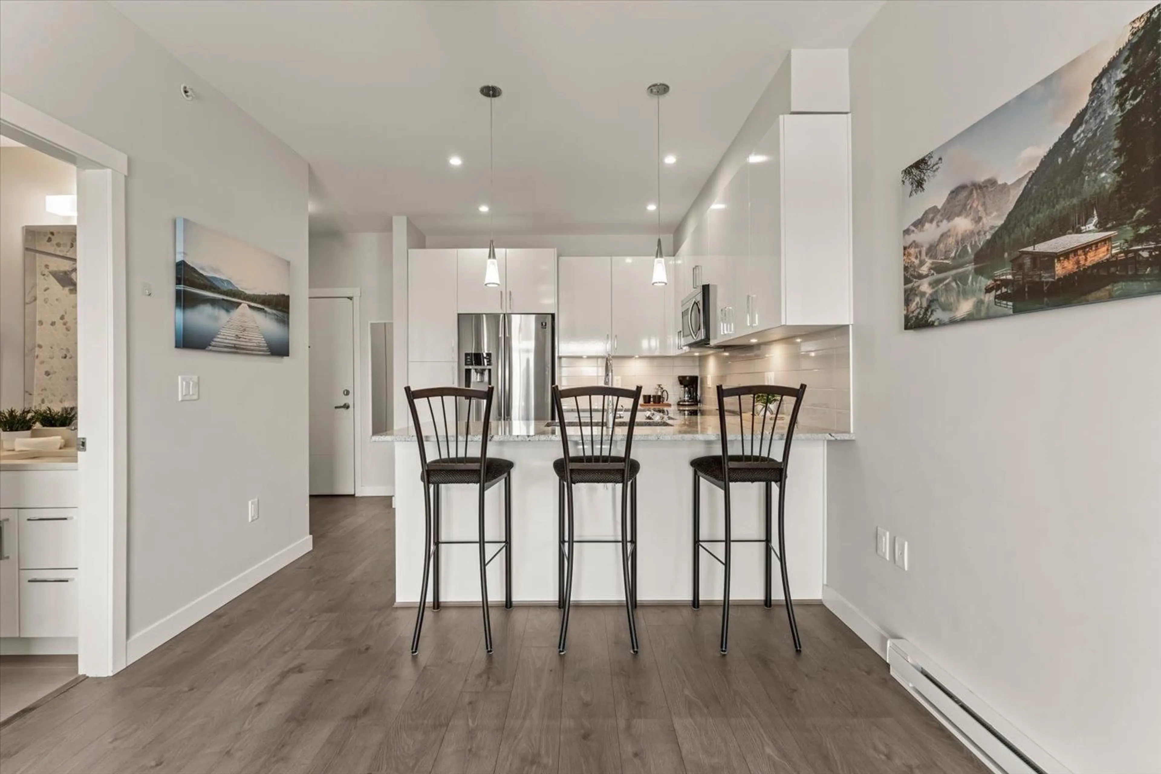 Open concept kitchen, wood/laminate floor for 501 - 45562 AIRPORT ROAD, Chilliwack British Columbia V2P0J8