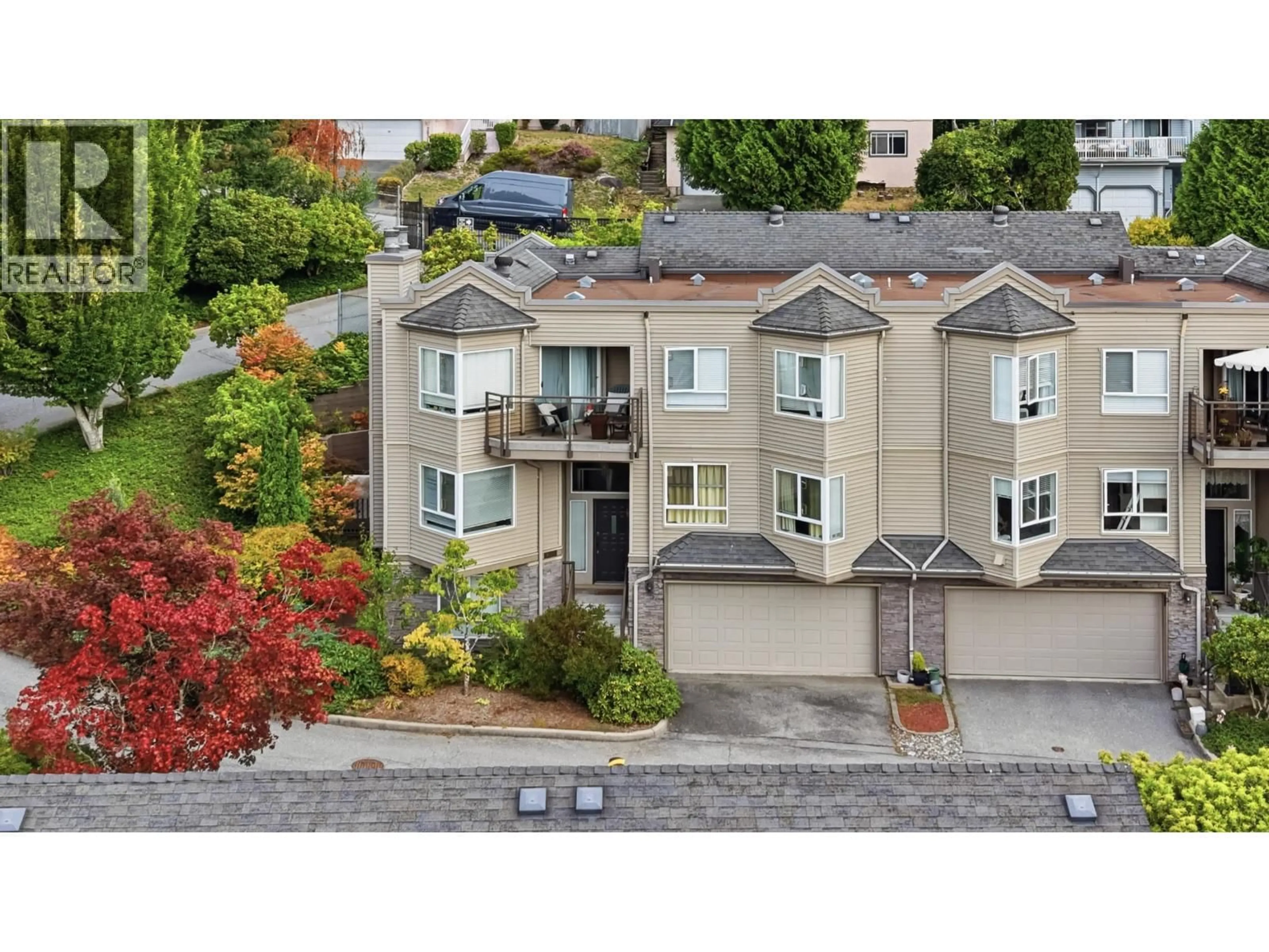 A pic from outside/outdoor area/front of a property/back of a property/a pic from drone, street for 411 - 1215 LANSDOWNE DRIVE, Coquitlam British Columbia V3E2P2