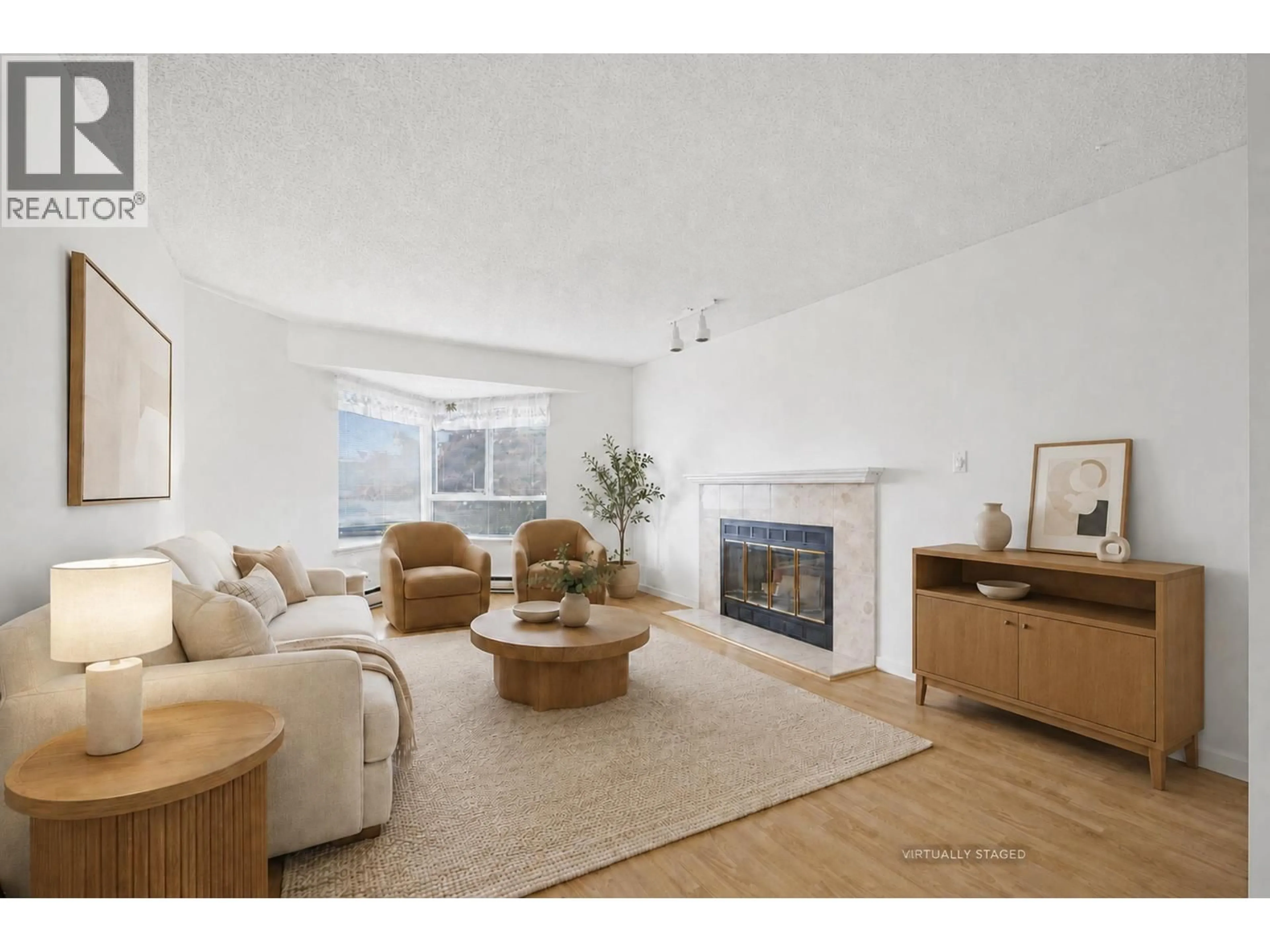 Living room with furniture, unknown for 411 - 1215 LANSDOWNE DRIVE, Coquitlam British Columbia V3E2P2