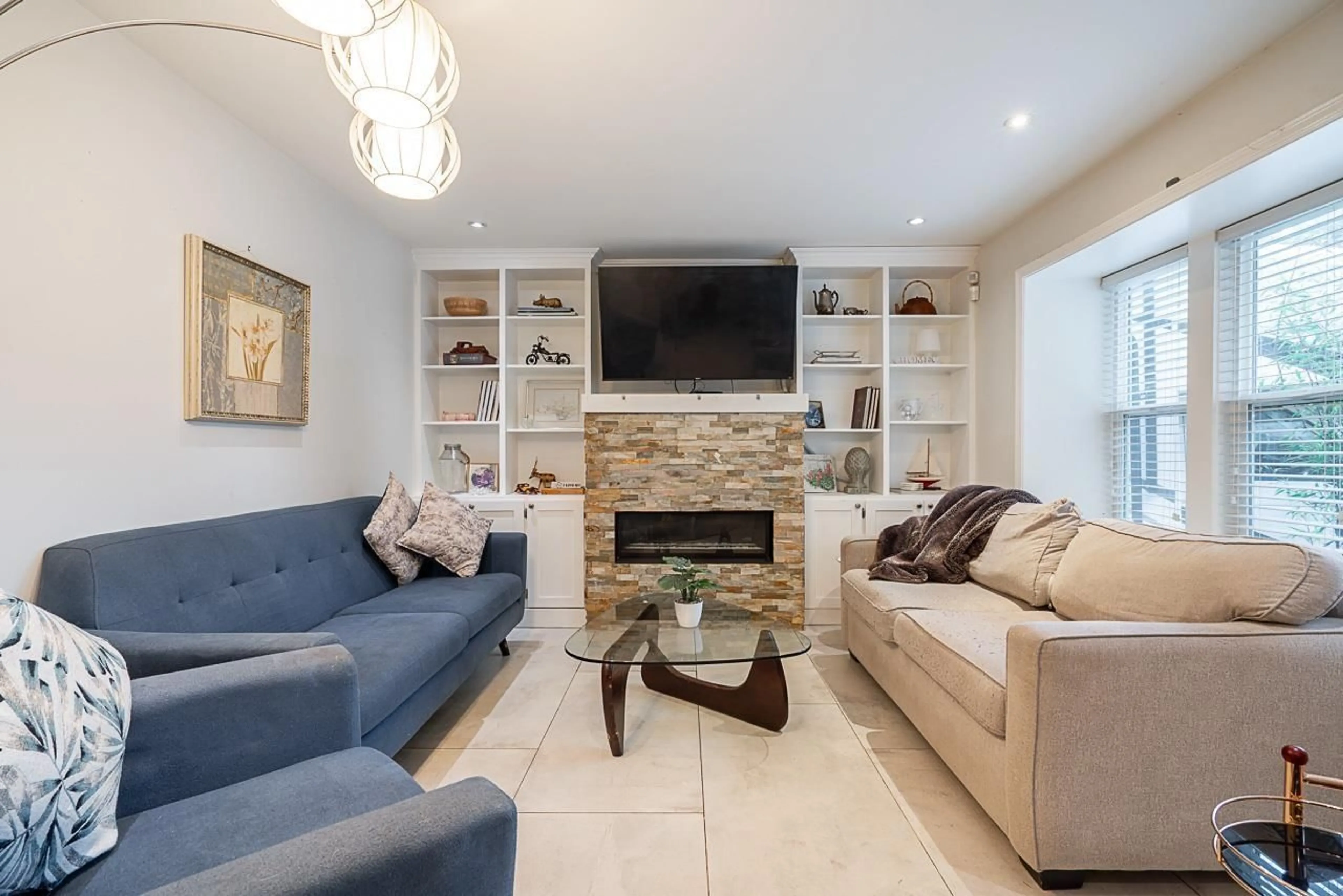 Living room with furniture, ceramic/tile floor for 7802 139A STREET, Surrey British Columbia V3W5H4