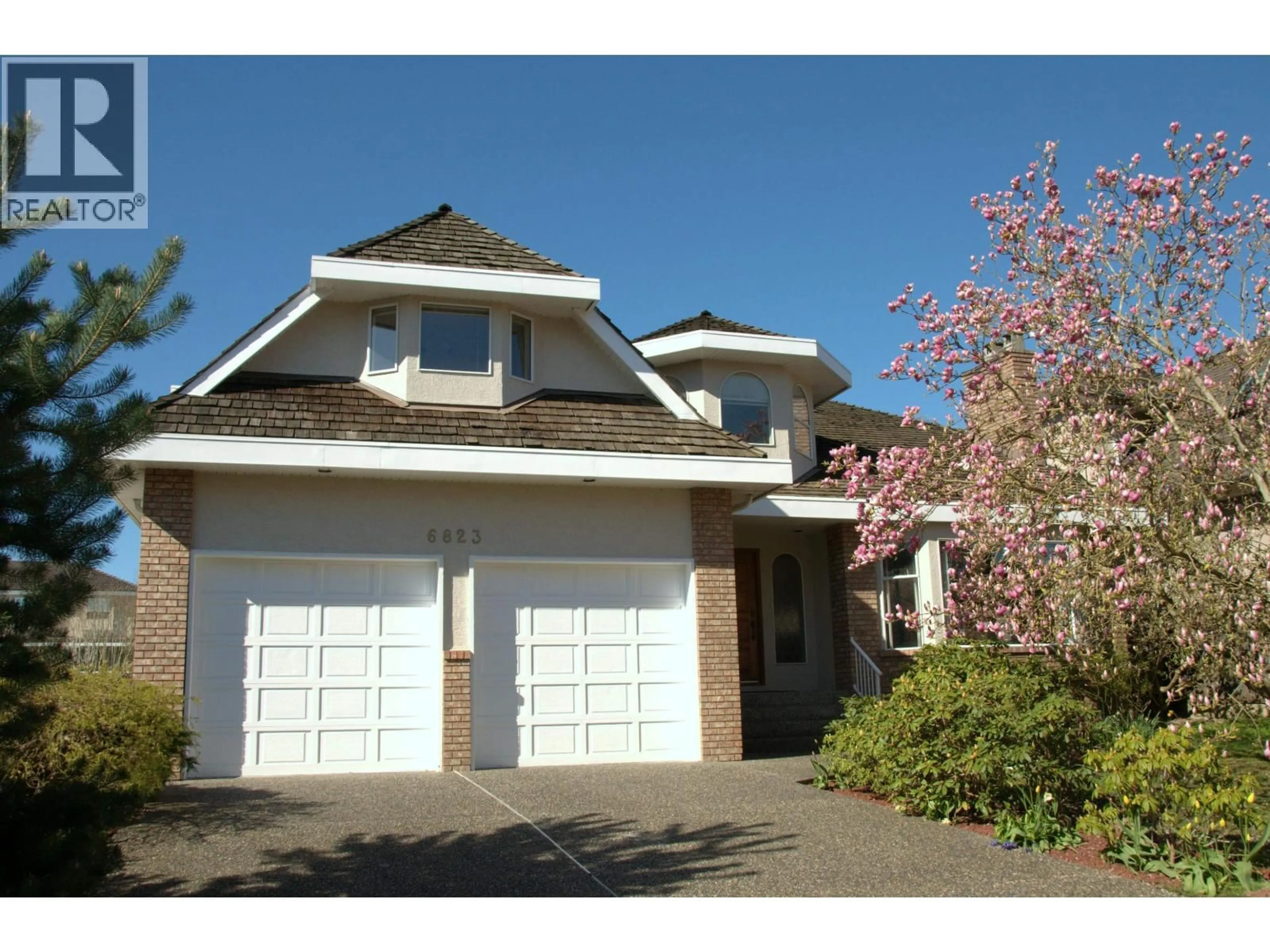 Home with vinyl exterior material, street for 6823 GRANT PLACE, Burnaby British Columbia V5B4X4