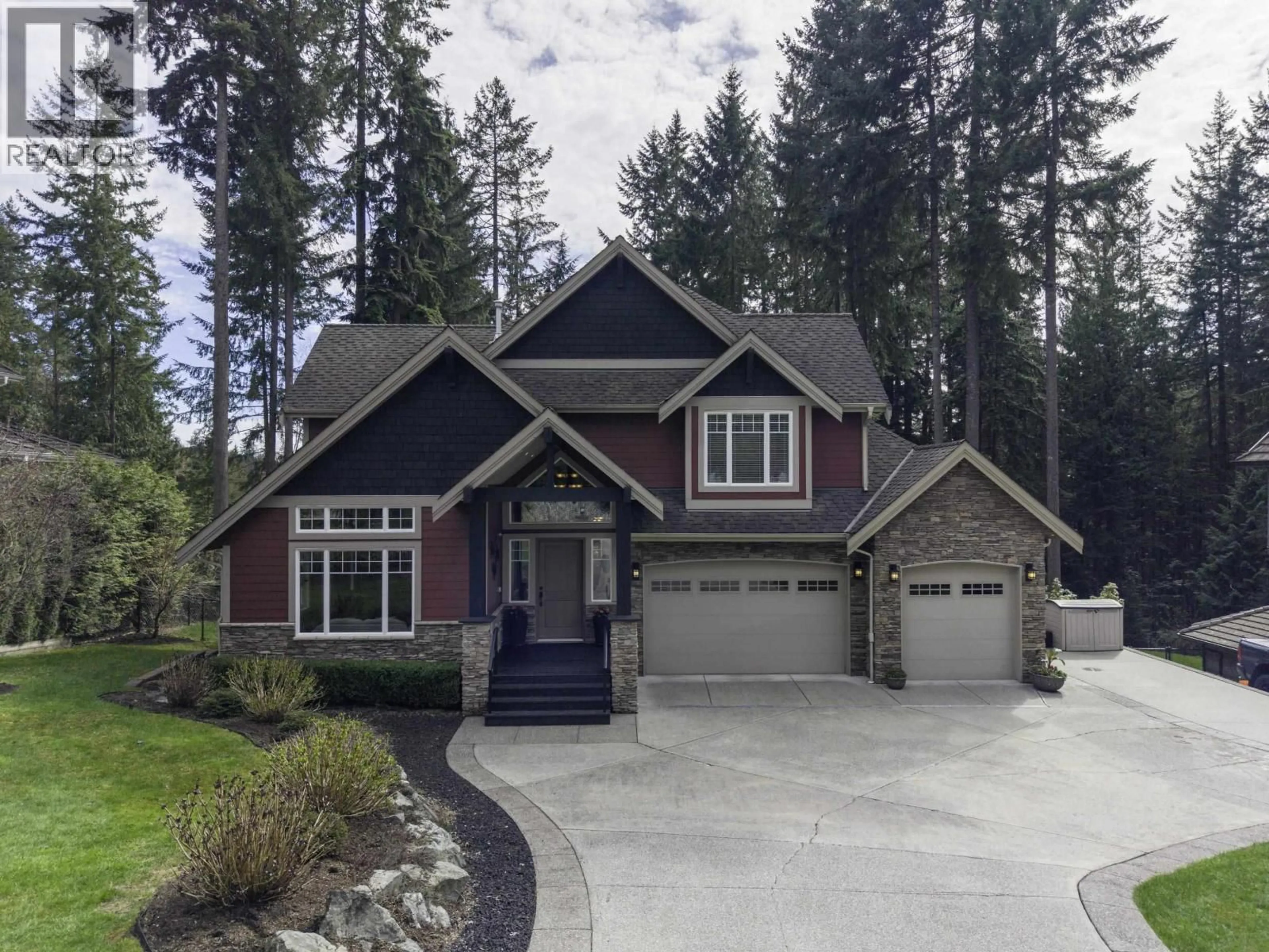 Home with vinyl exterior material, street for 1056 RAVENSWOOD DRIVE, Anmore British Columbia V3H5M6