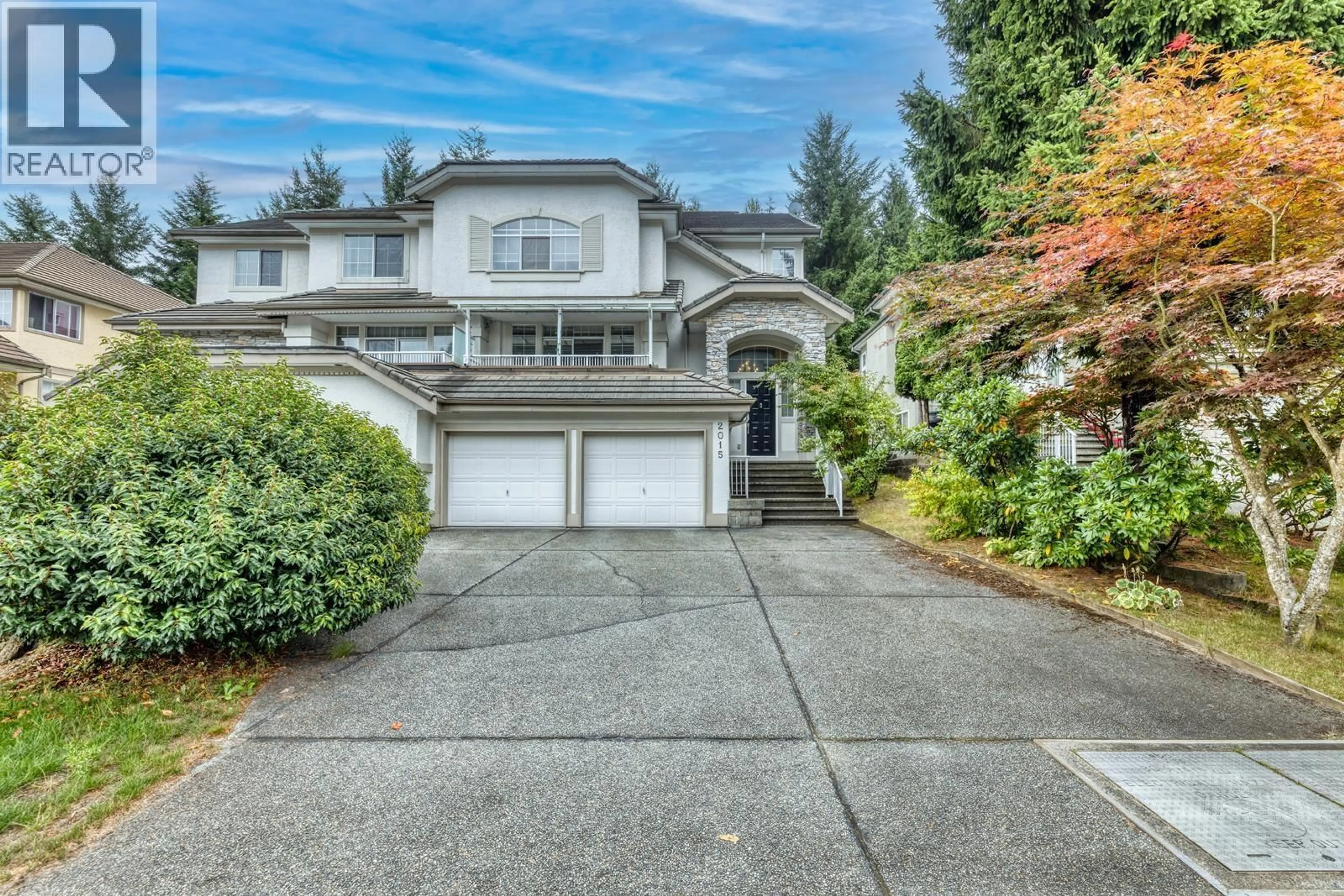 Home with vinyl exterior material, street for 2015 PARKWAY BOULEVARD, Coquitlam British Columbia V3E3J8