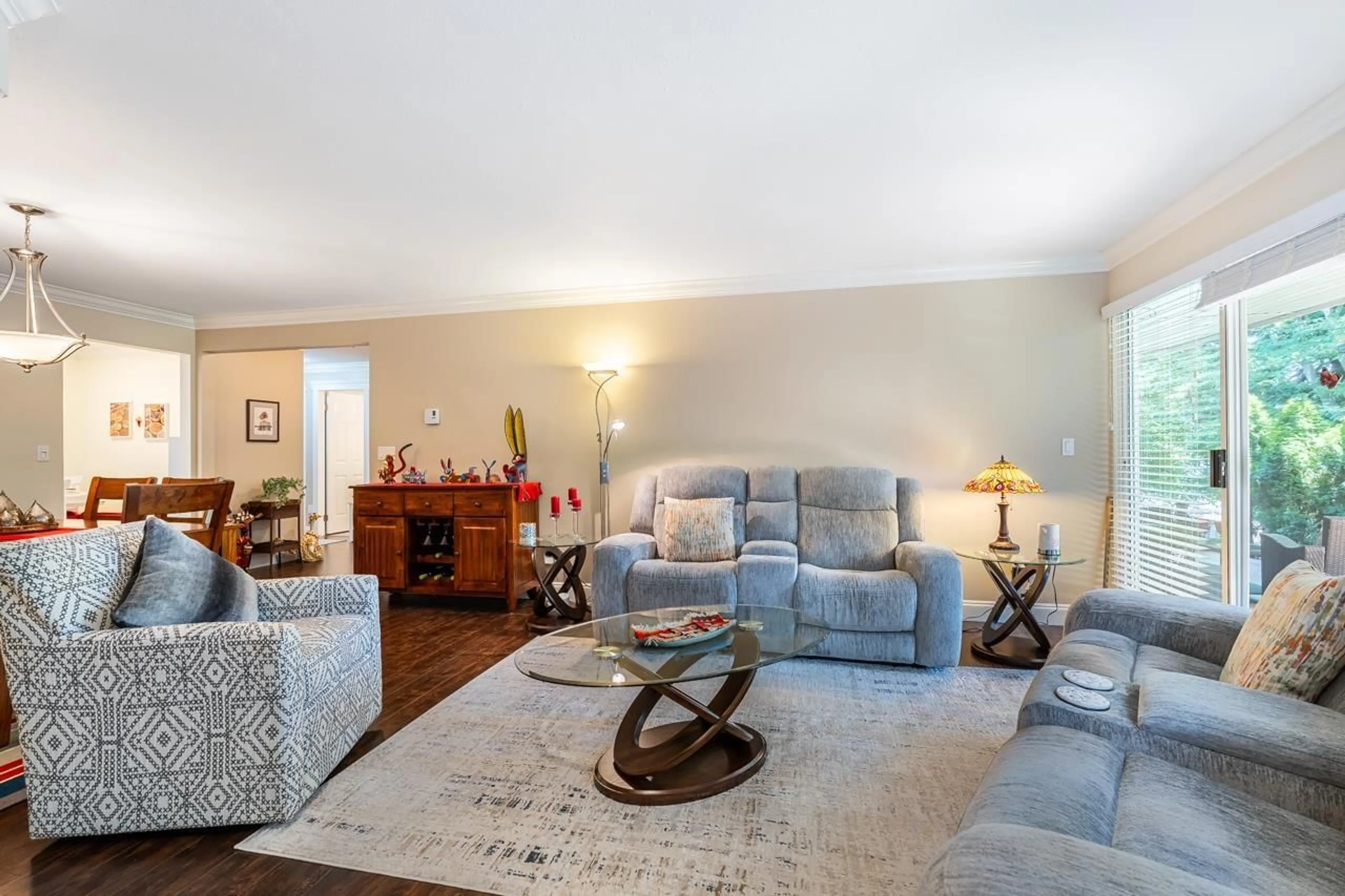 Living room with furniture, wood/laminate floor for 101 - 6866 NICHOLSON ROAD, Delta British Columbia V4E3M6