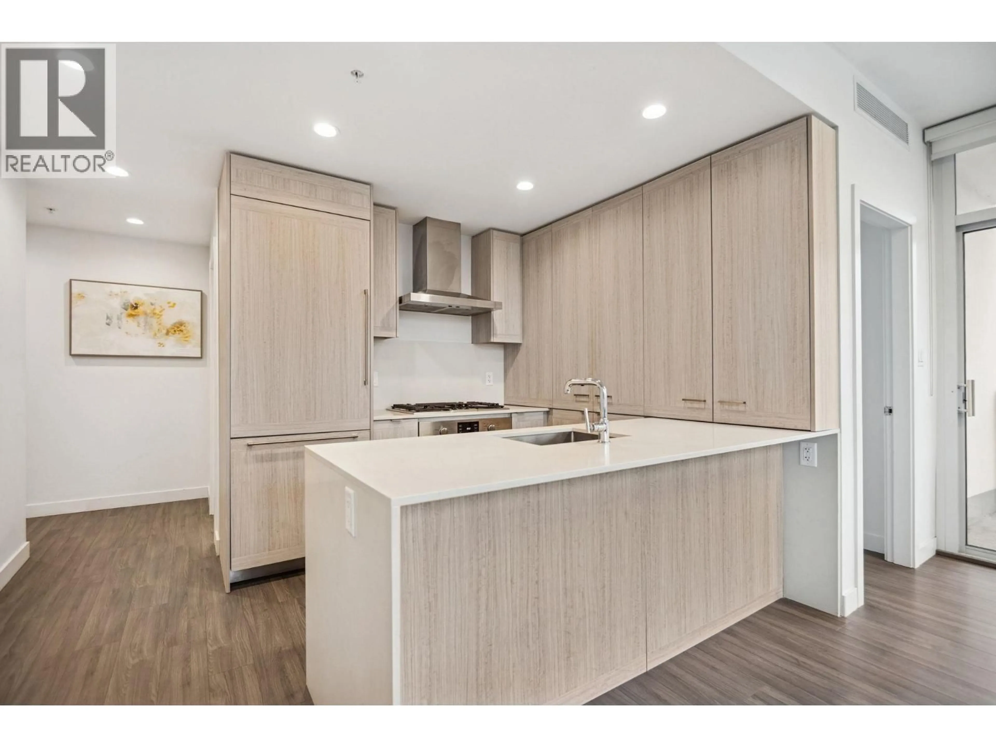 Open concept kitchen, wood/laminate floor for 3207 - 2311 BETA AVENUE, Burnaby British Columbia V5C0M1
