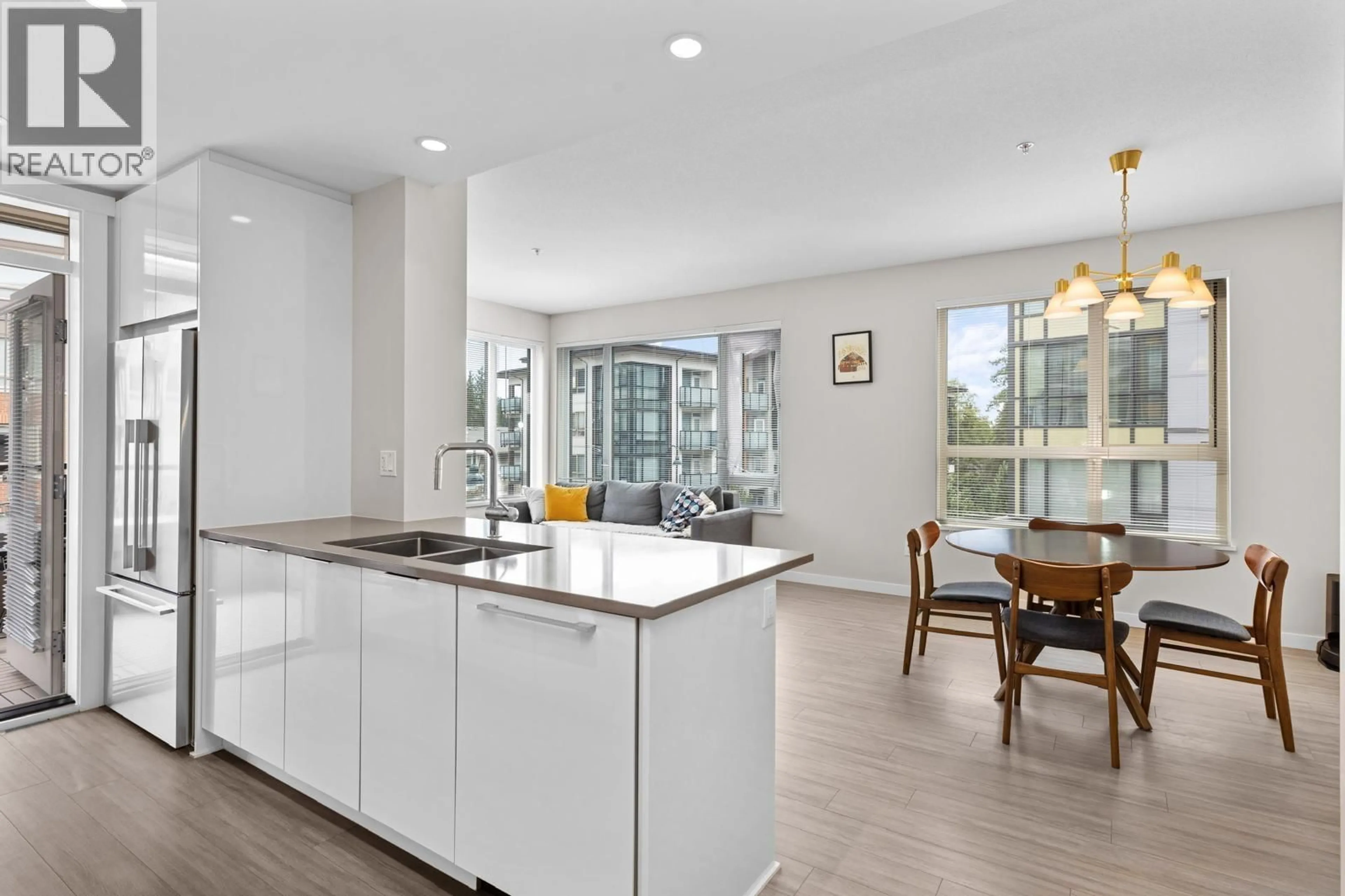 Open concept kitchen, unknown for 212 - 2663 LIBRARY LANE, North Vancouver British Columbia V7J0B9