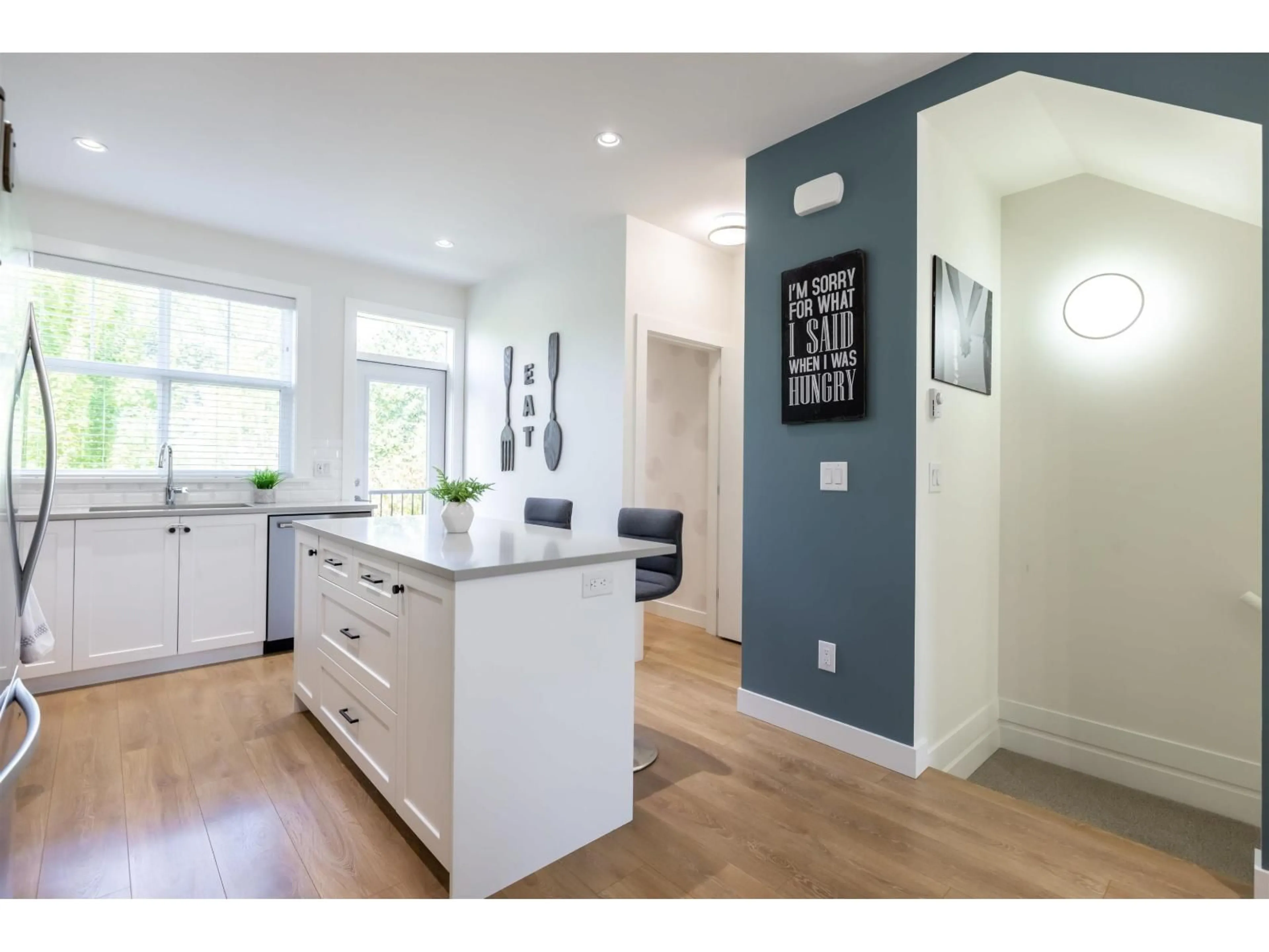 Open concept kitchen, wood/laminate floor for 54 - 27735 ROUNDHOUSE DRIVE, Abbotsford British Columbia V4X0B9