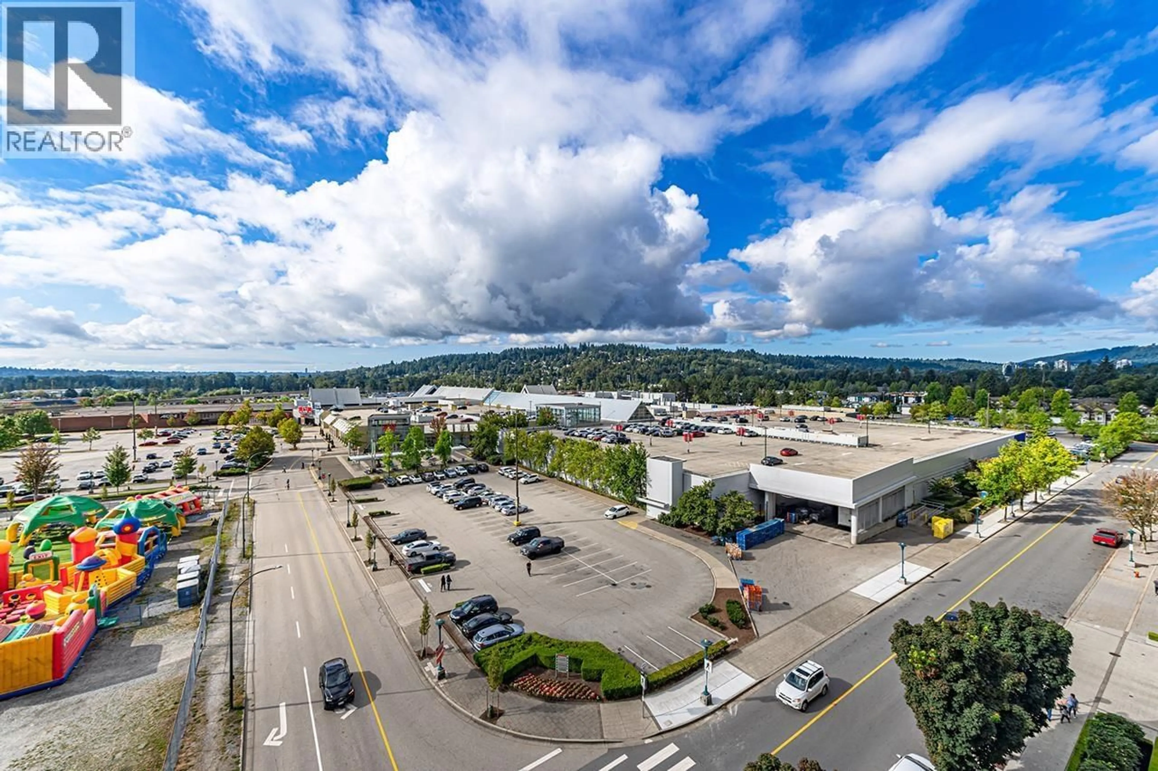 A pic from outside/outdoor area/front of a property/back of a property/a pic from drone, mountain view for 905 - 2975 ATLANTIC AVENUE, Coquitlam British Columbia V3B0C5