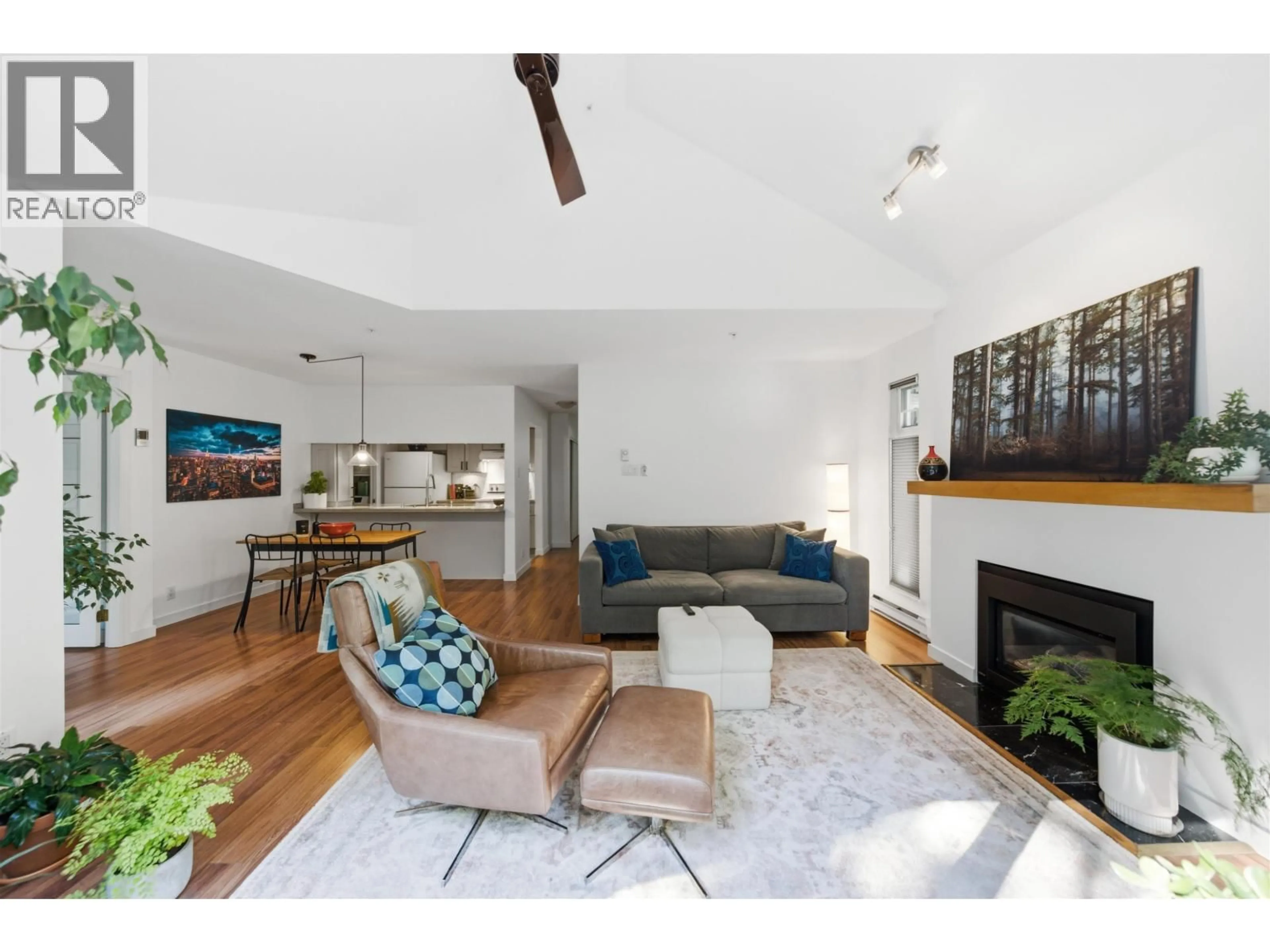 Living room with furniture, wood/laminate floor for 304 - 865 15TH AVENUE, Vancouver British Columbia V5Z1R8
