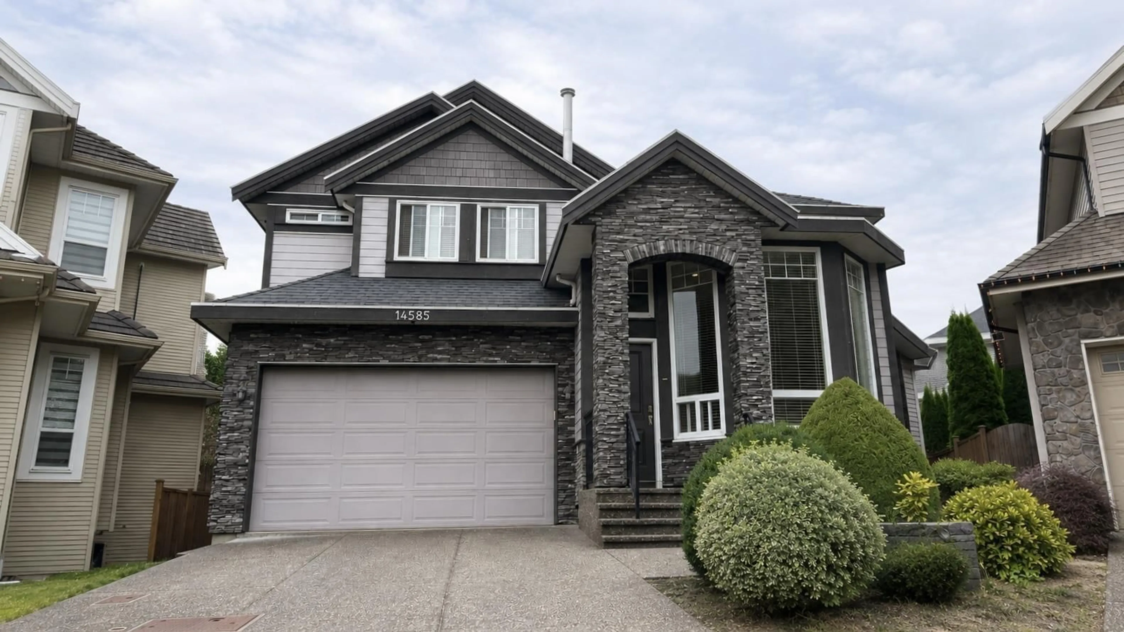 Home with vinyl exterior material, street for 14585 59A AVENUE, Surrey British Columbia V3S7B5
