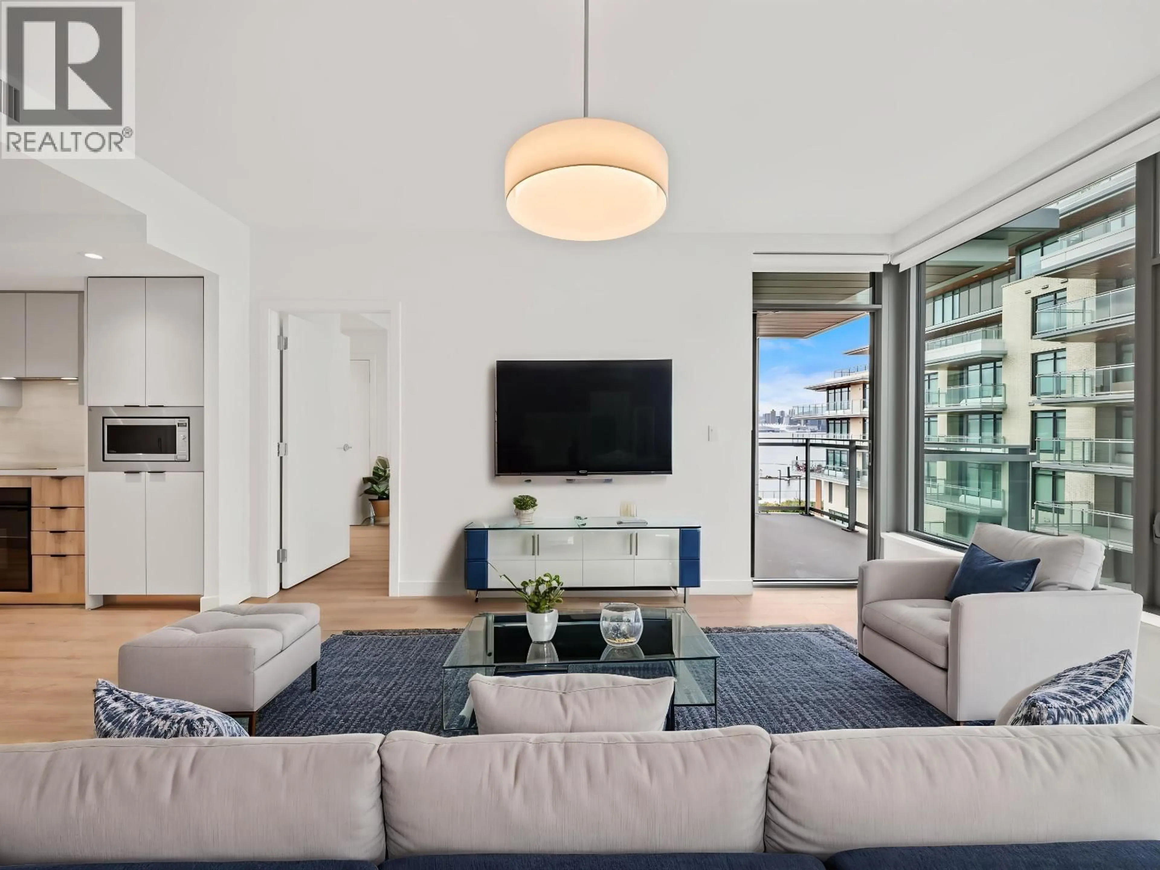 Living room with furniture, unknown for 425 - 755 HARBOURSIDE DRIVE, North Vancouver British Columbia V7P0G1