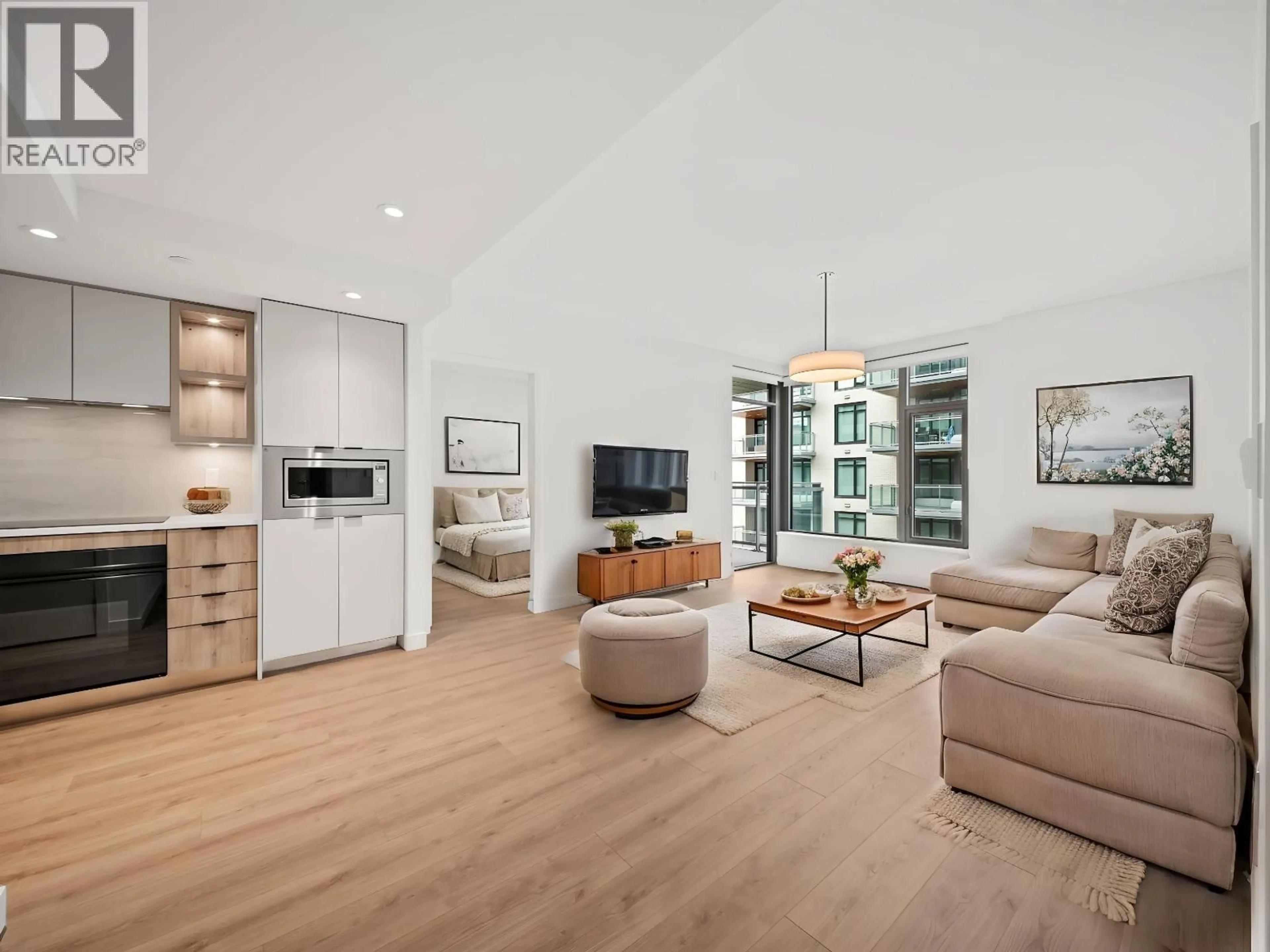 Living room with furniture, unknown for 425 - 755 HARBOURSIDE DRIVE, North Vancouver British Columbia V7P0G1