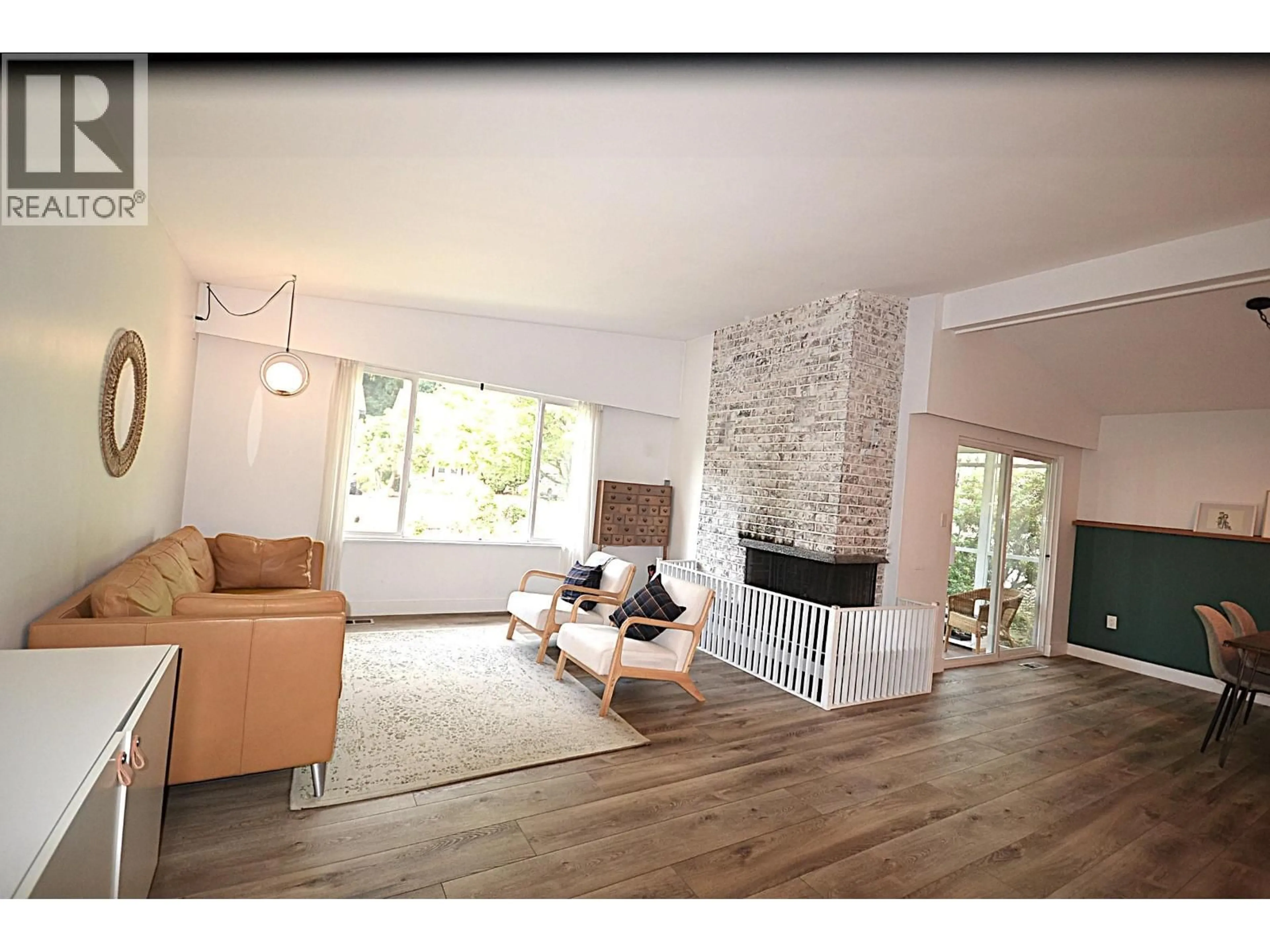Living room with furniture, wood/laminate floor for 2280 KING ALBERT AVENUE, Coquitlam British Columbia V3J1Z5