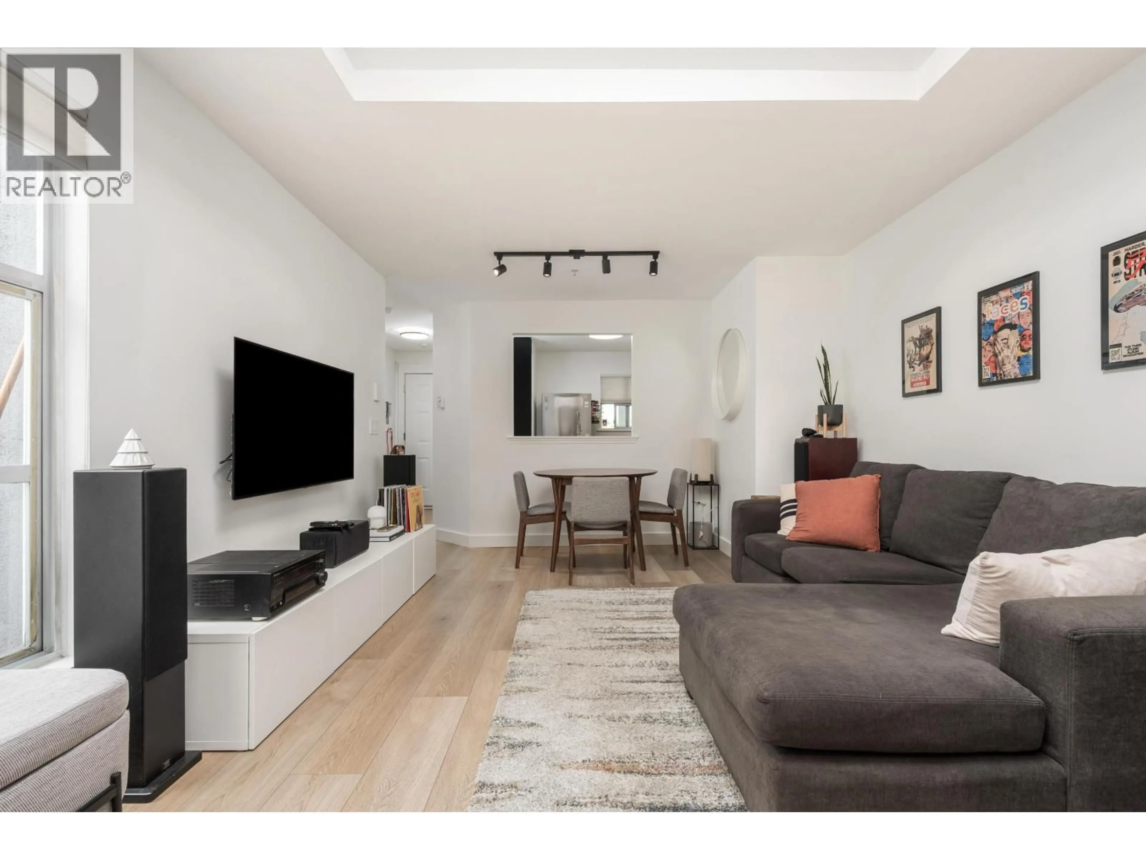 Living room with furniture, wood/laminate floor for 407 - 1333 7TH AVENUE, Vancouver British Columbia V6H1B8
