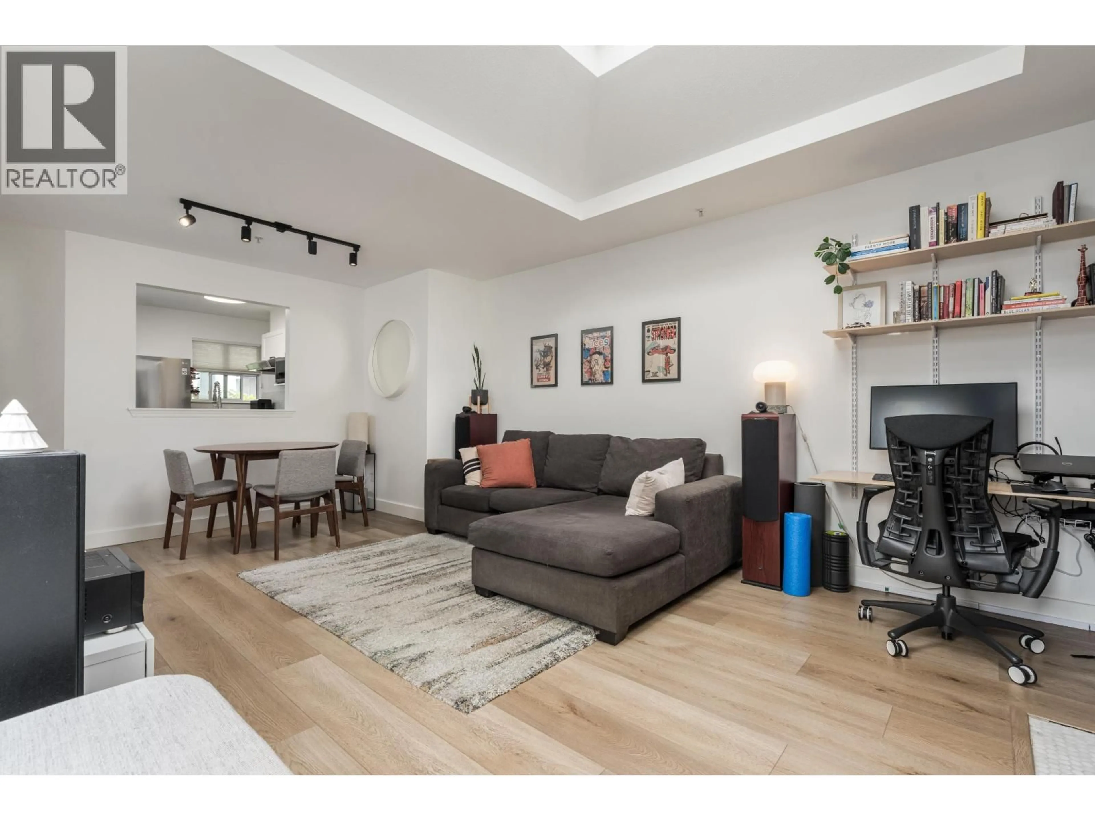 Living room with furniture, wood/laminate floor for 407 - 1333 7TH AVENUE, Vancouver British Columbia V6H1B8