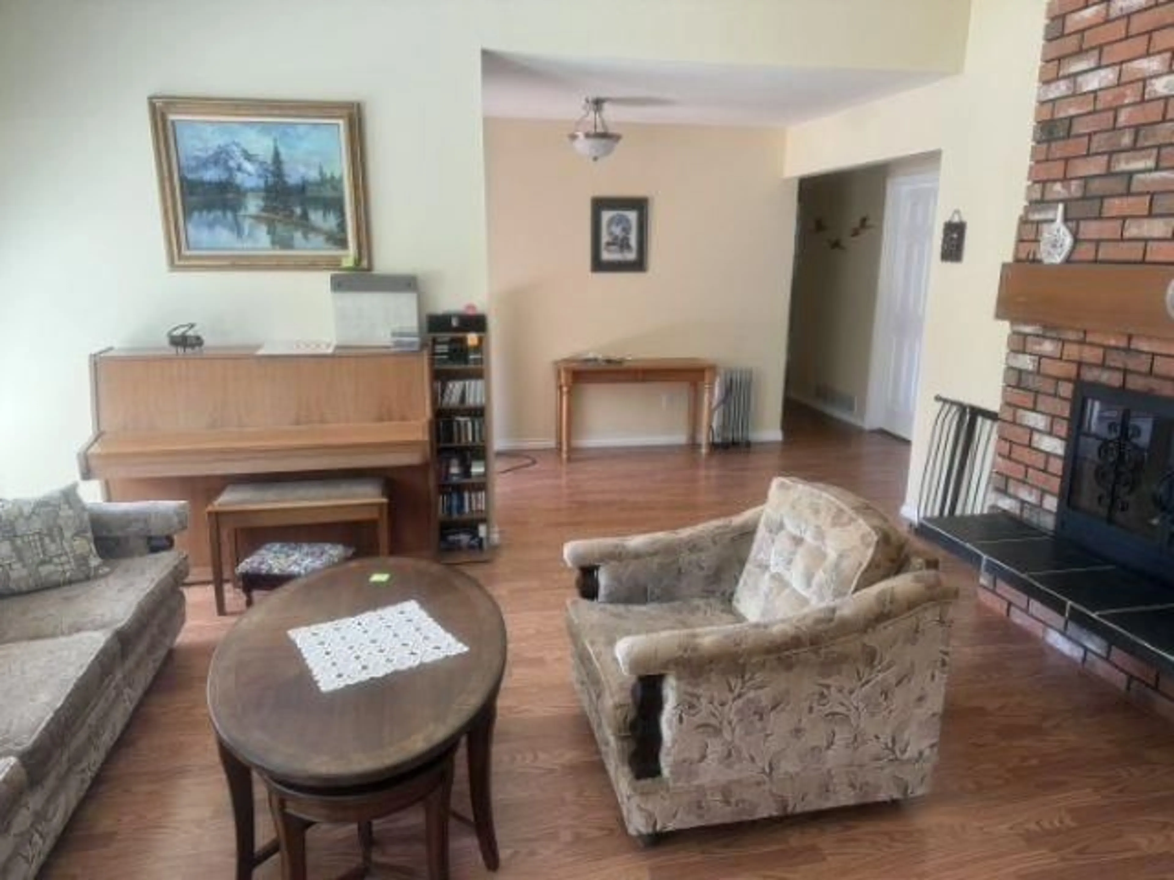Living room with furniture, wood/laminate floor for 12719 17A AVENUE, Surrey British Columbia V4A5T5