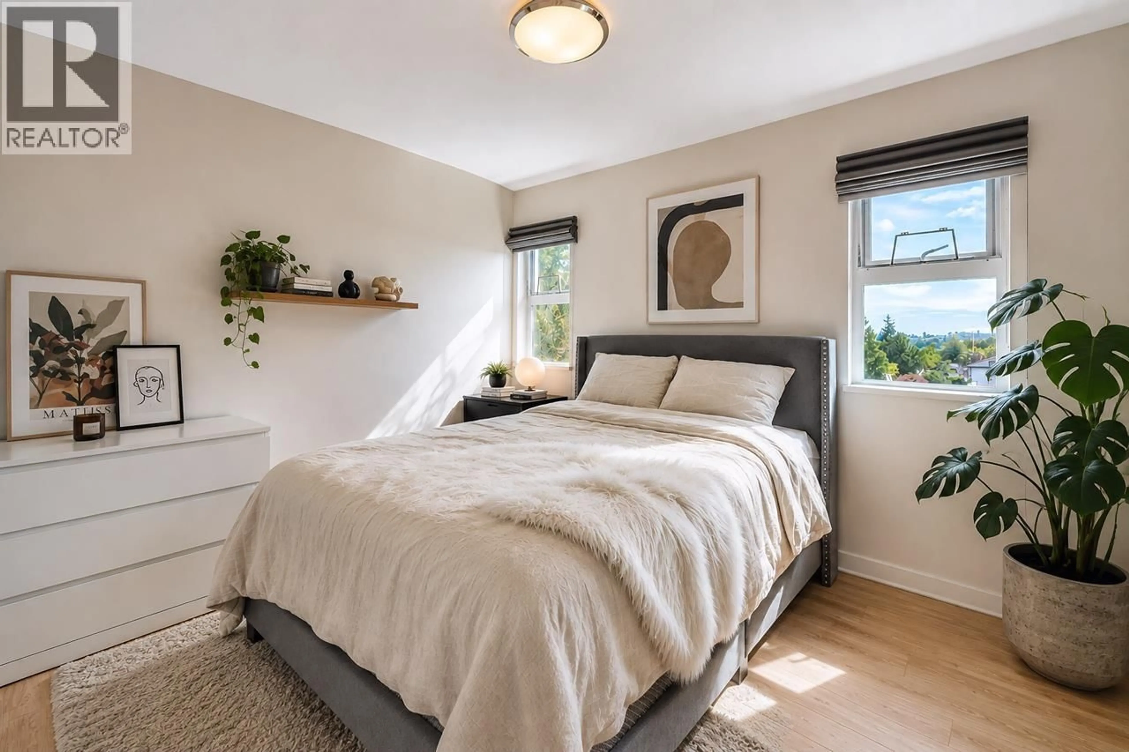 Bedroom with bed, wood/laminate floor for 519 - 2888 2ND AVENUE, Vancouver British Columbia V5M0B9