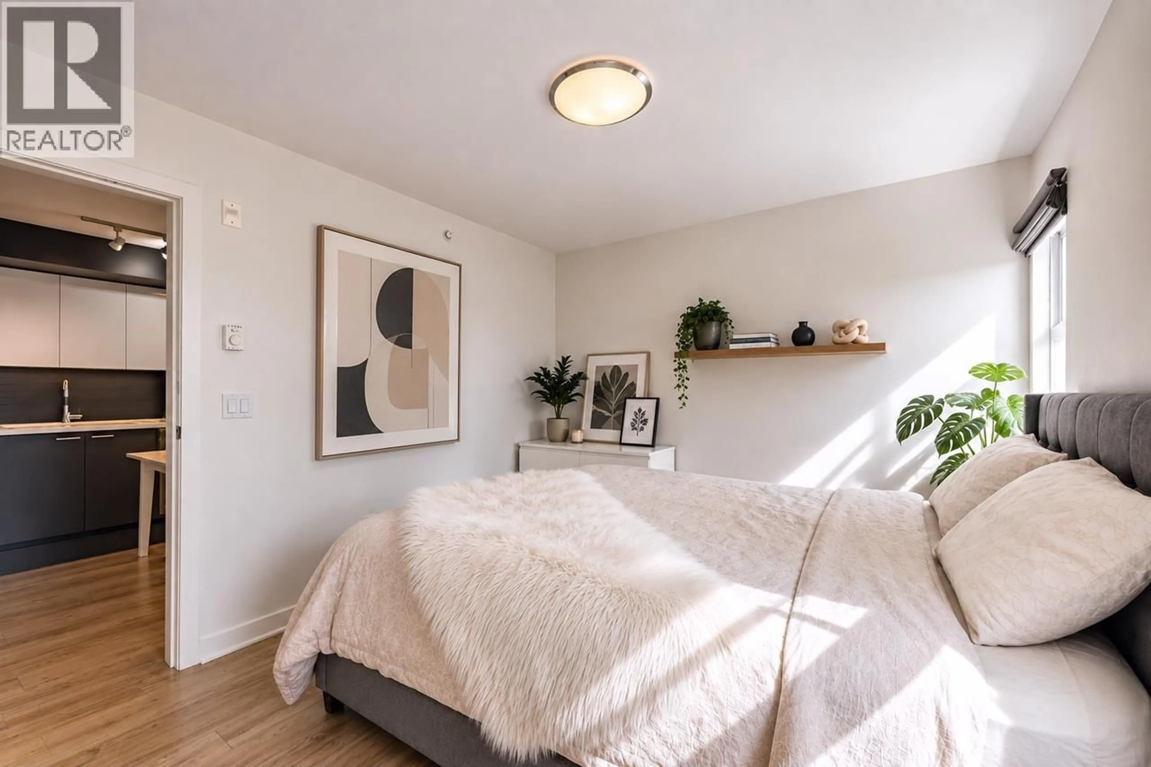 Bedroom with bed, wood/laminate floor for 519 - 2888 2ND AVENUE, Vancouver British Columbia V5M0B9