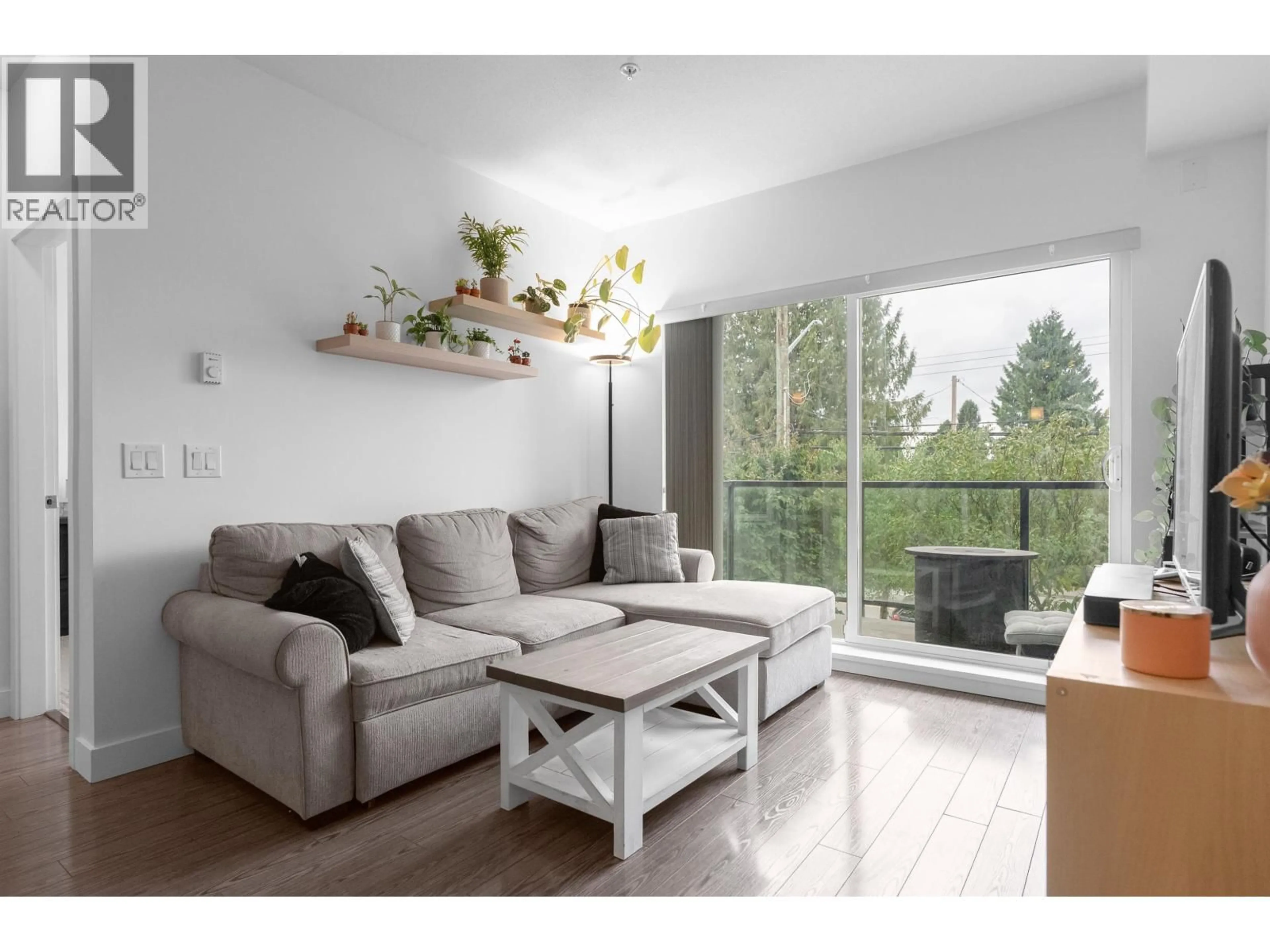 Living room with furniture, wood/laminate floor for 207 - 12070 227 STREET, Maple Ridge British Columbia V2X6J5