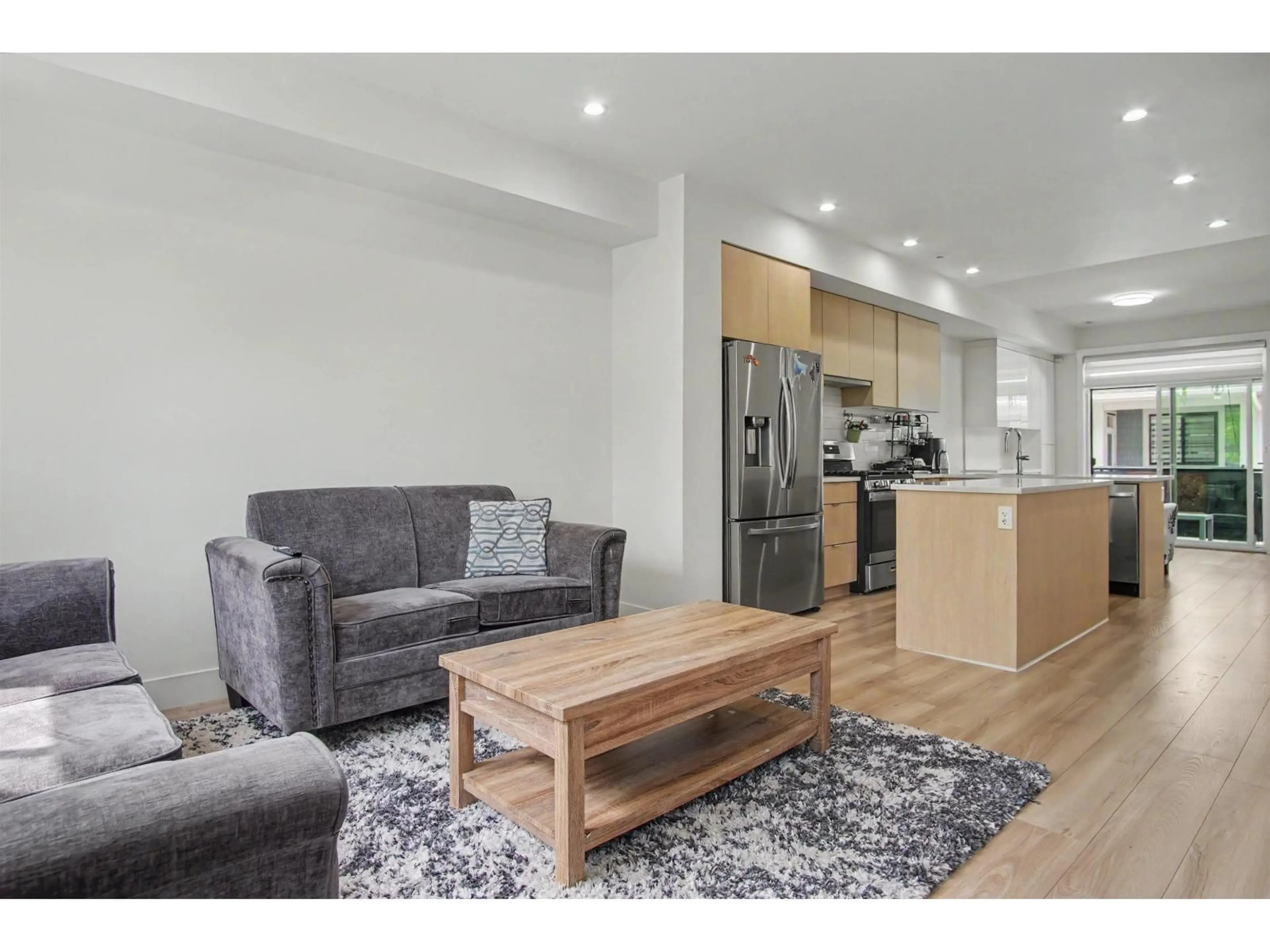 Open concept kitchen, wood/laminate floor for 30 - 11556 72A AVENUE, Delta British Columbia V4C1A9