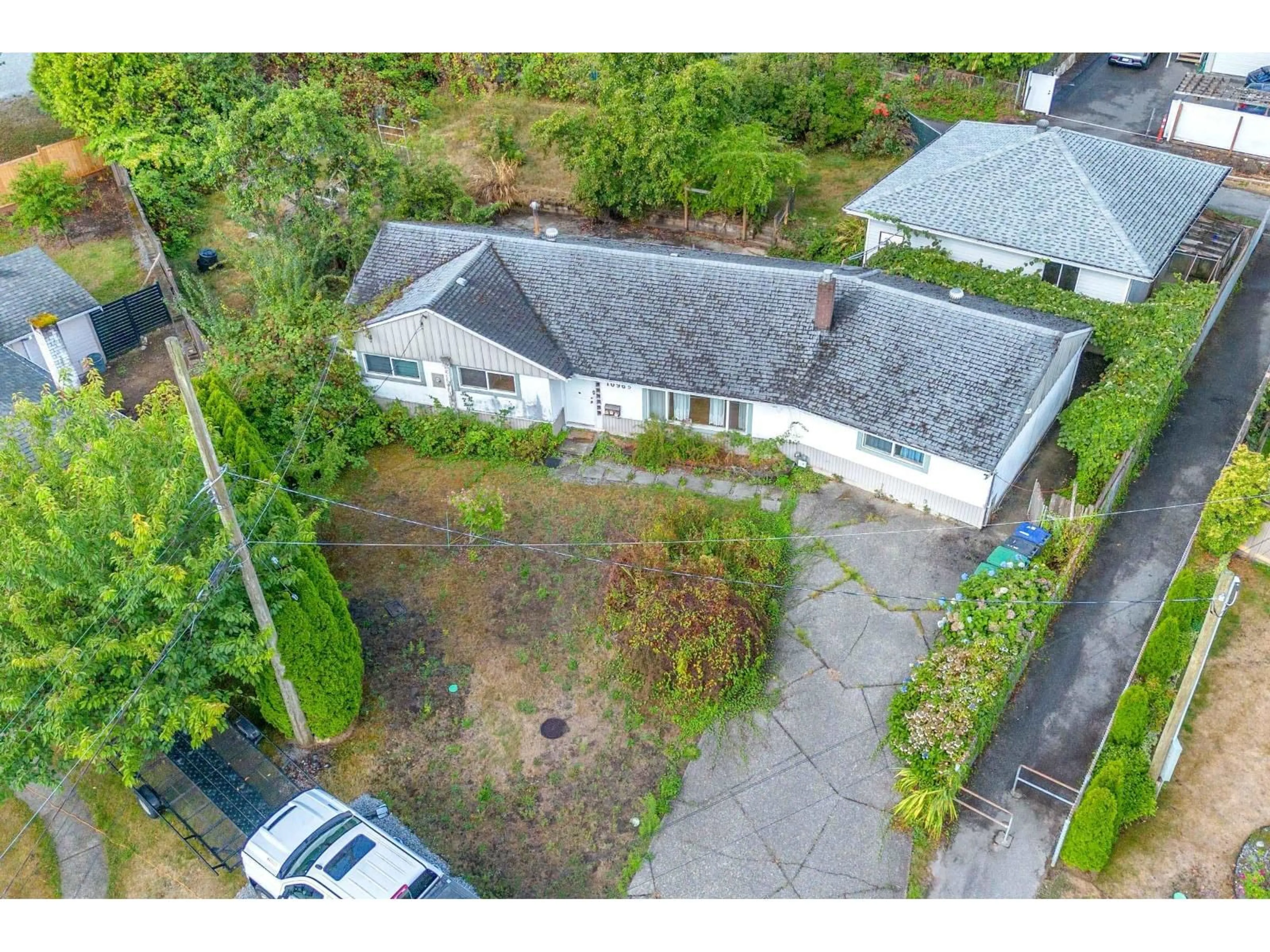 A pic from outside/outdoor area/front of a property/back of a property/a pic from drone, street for 10965 LARK PLACE, Surrey British Columbia V3R4W1