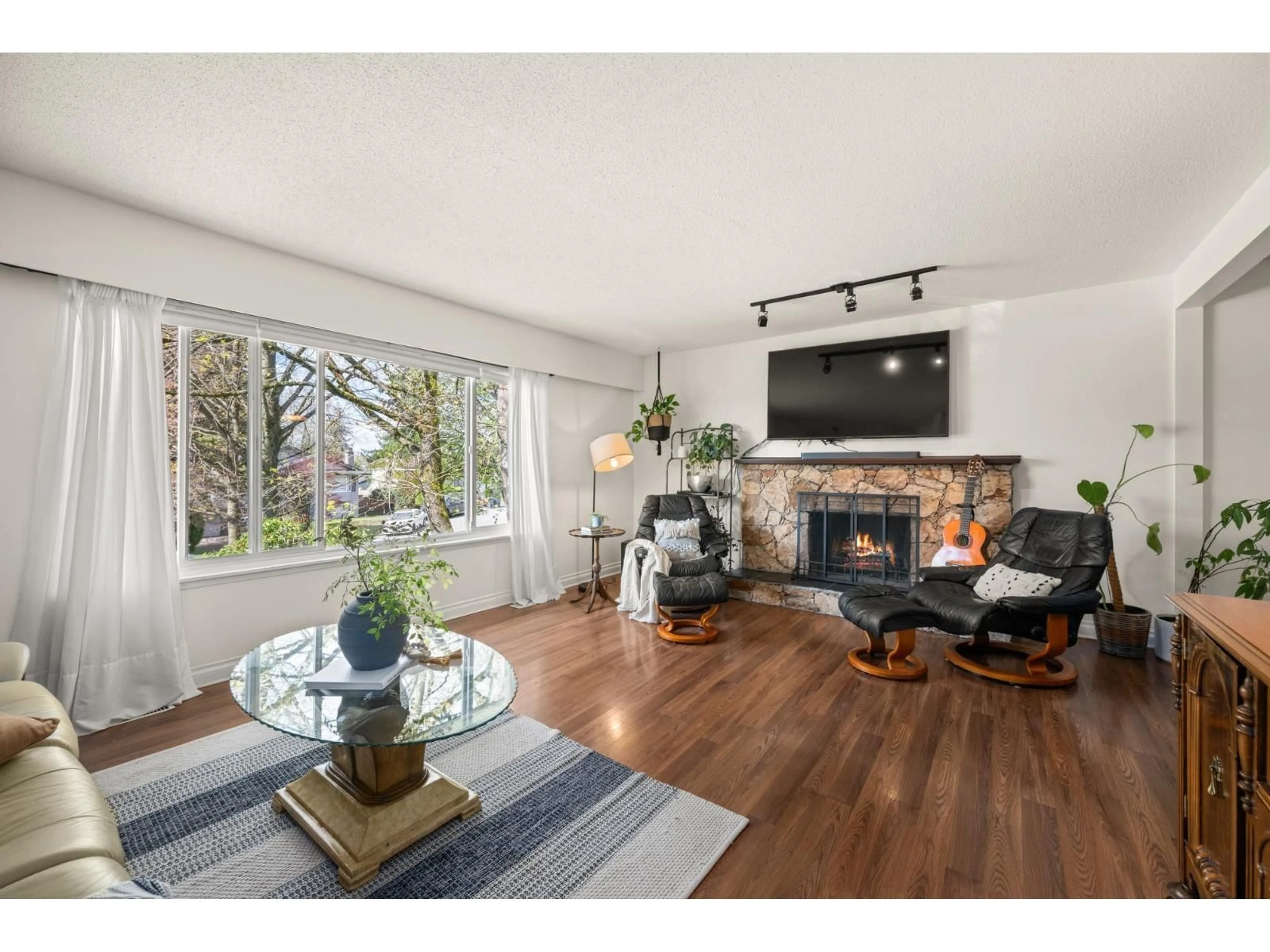 Living room with furniture, wood/laminate floor for 5866 179A STREET, Surrey British Columbia V3S4K3