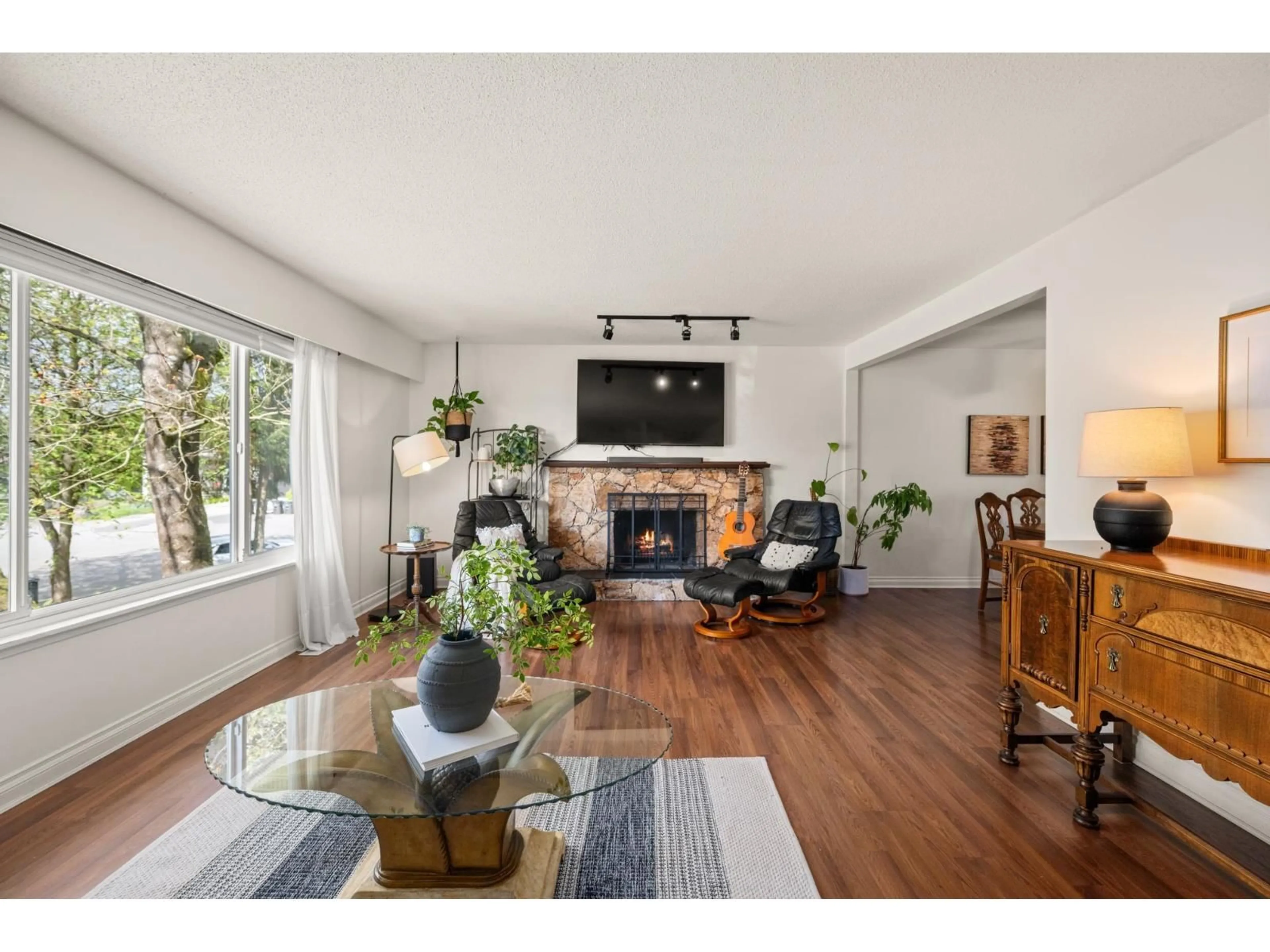 Living room with furniture, wood/laminate floor for 5866 179A STREET, Surrey British Columbia V3S4K3