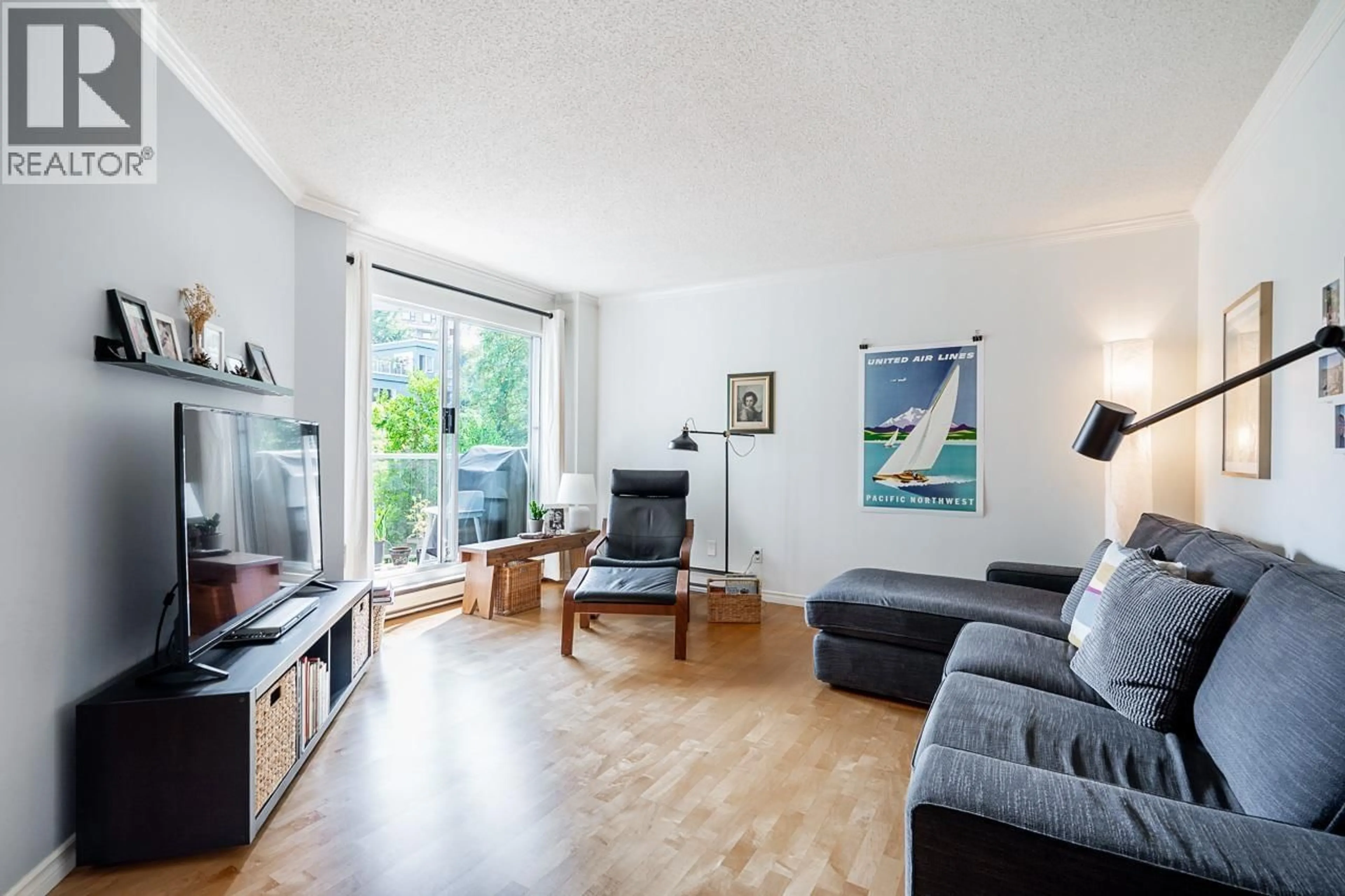 Living room with furniture, wood/laminate floor for 303 - 1510 1ST AVENUE, Vancouver British Columbia V6J4S3