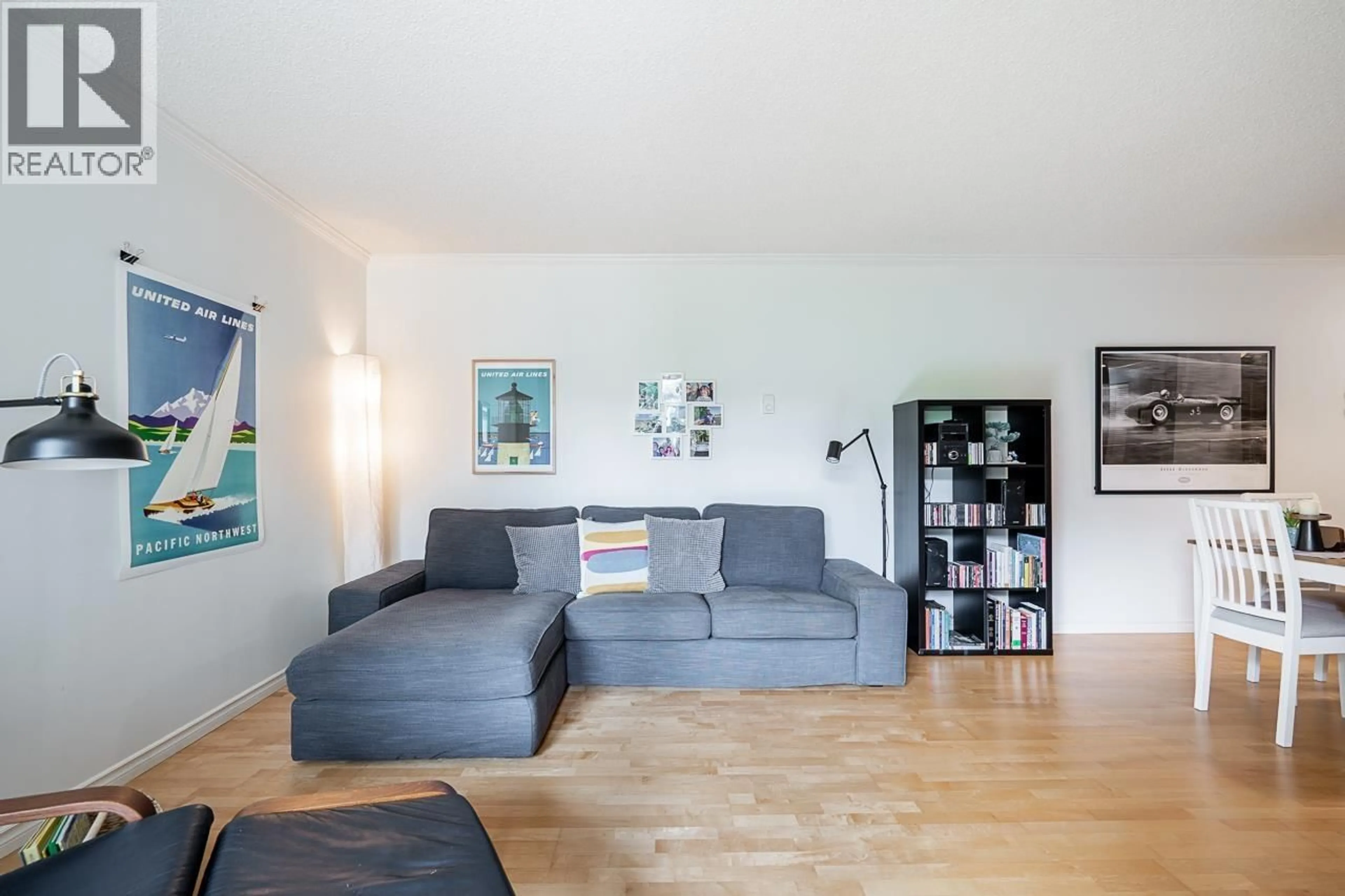 Living room with furniture, wood/laminate floor for 303 - 1510 1ST AVENUE, Vancouver British Columbia V6J4S3