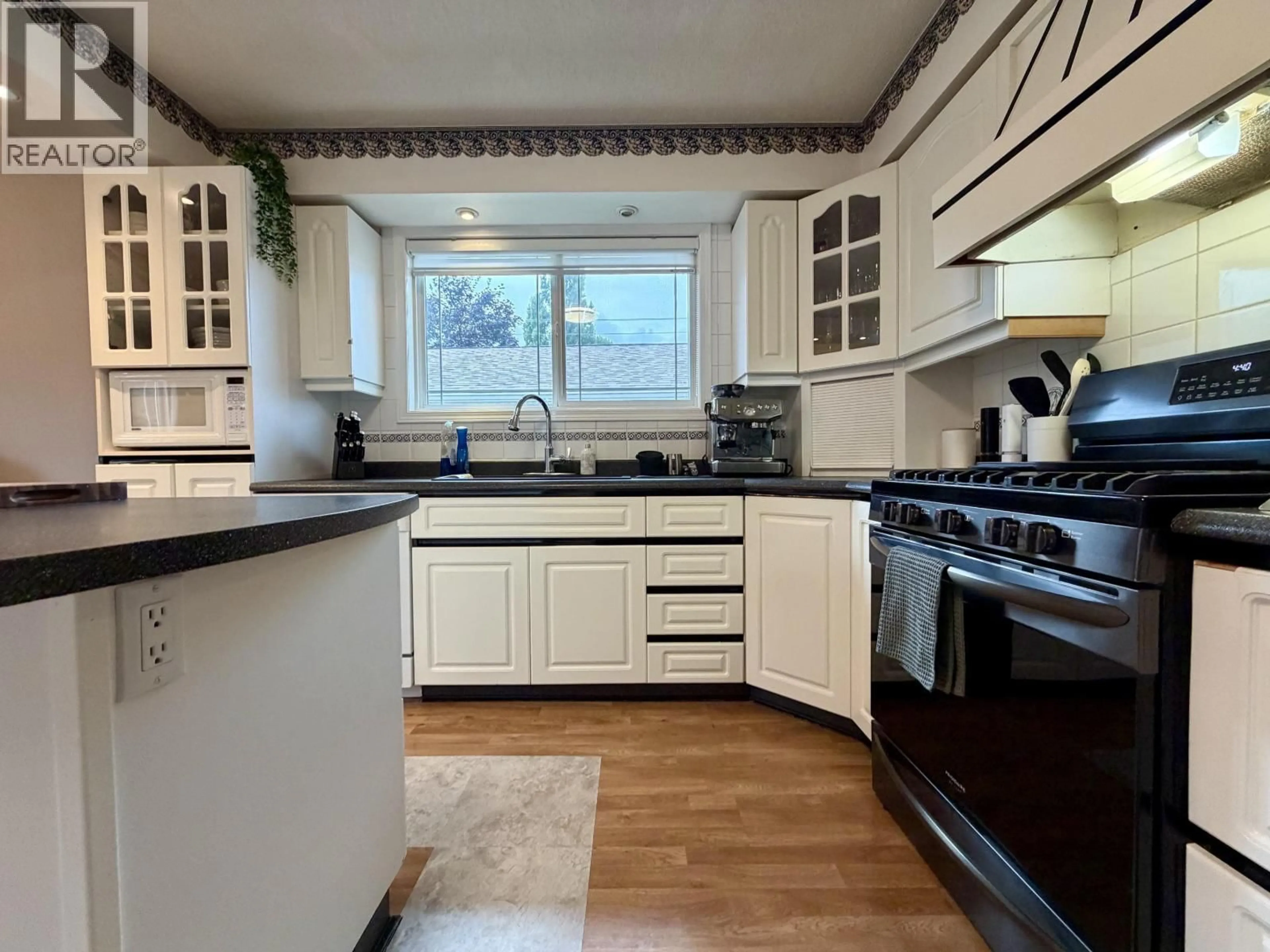 Standard kitchen, ceramic/tile floor for 4280 FIRST AVENUE, Smithers British Columbia V0J2N0