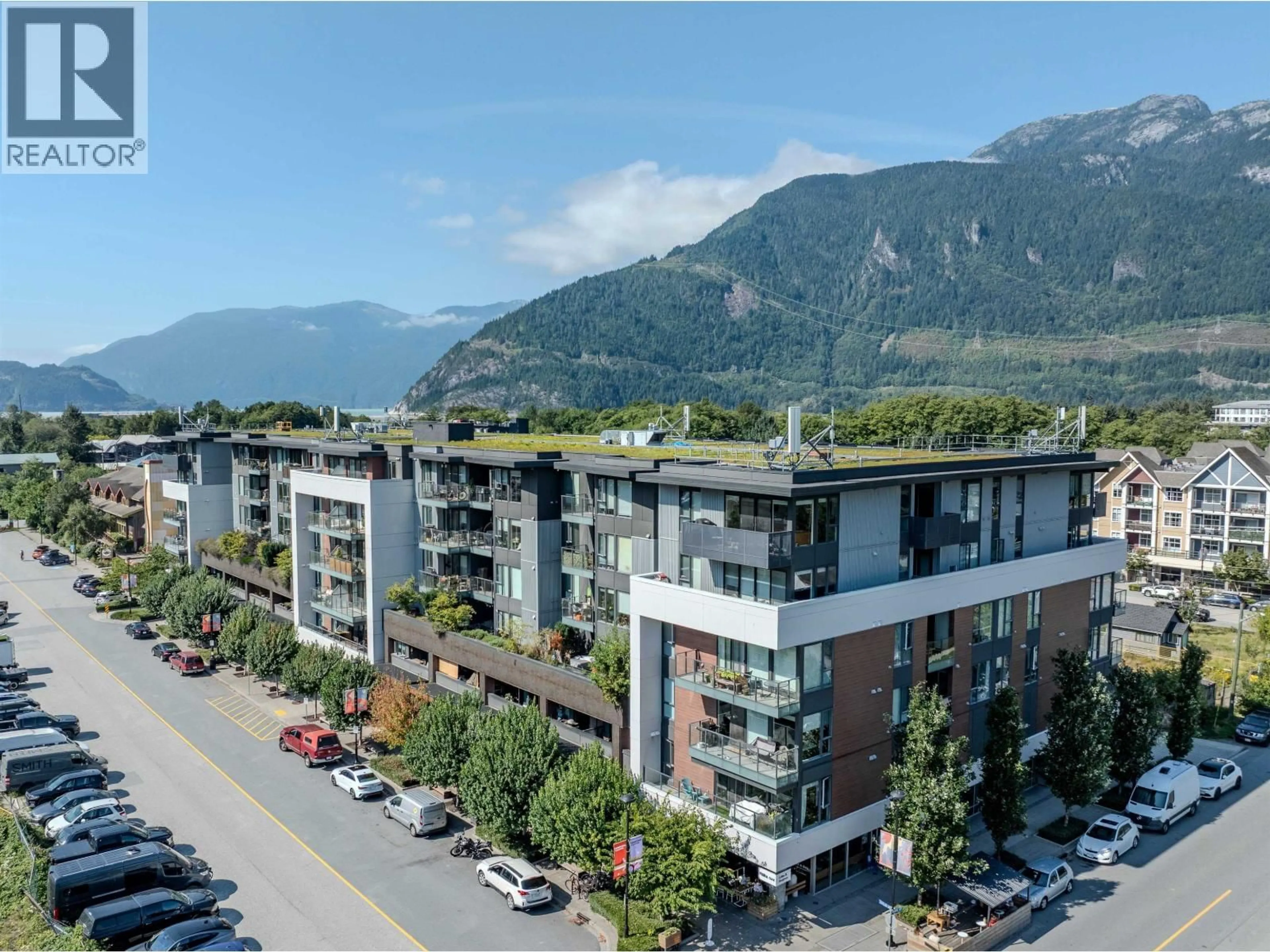 A pic from outside/outdoor area/front of a property/back of a property/a pic from drone, mountain view for 203 - 37881 CLEVELAND AVENUE, Squamish British Columbia V8B0Z7