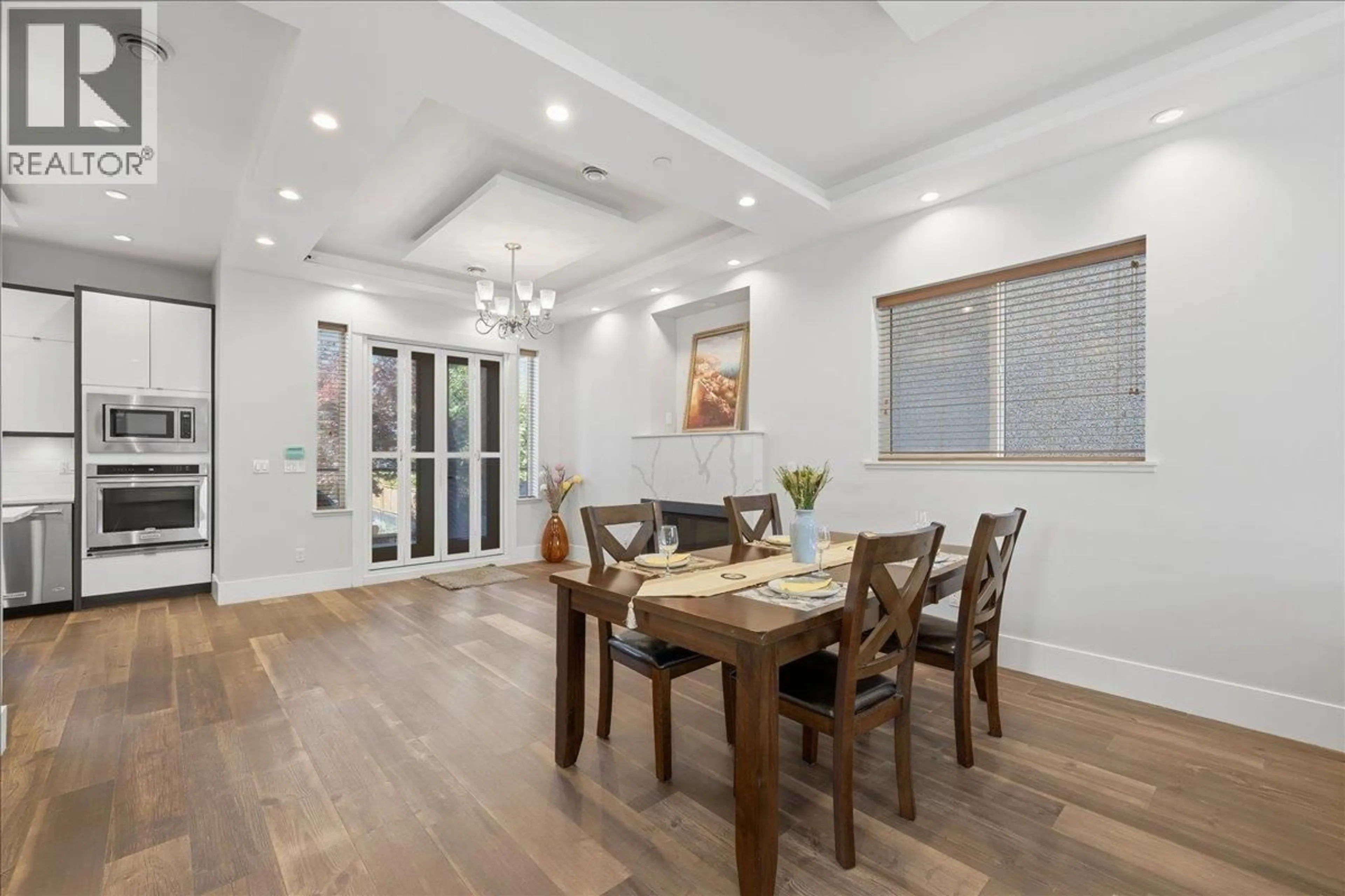 Dining room, wood/laminate floor for 3123 7TH AVENUE, Vancouver British Columbia V5M1V6