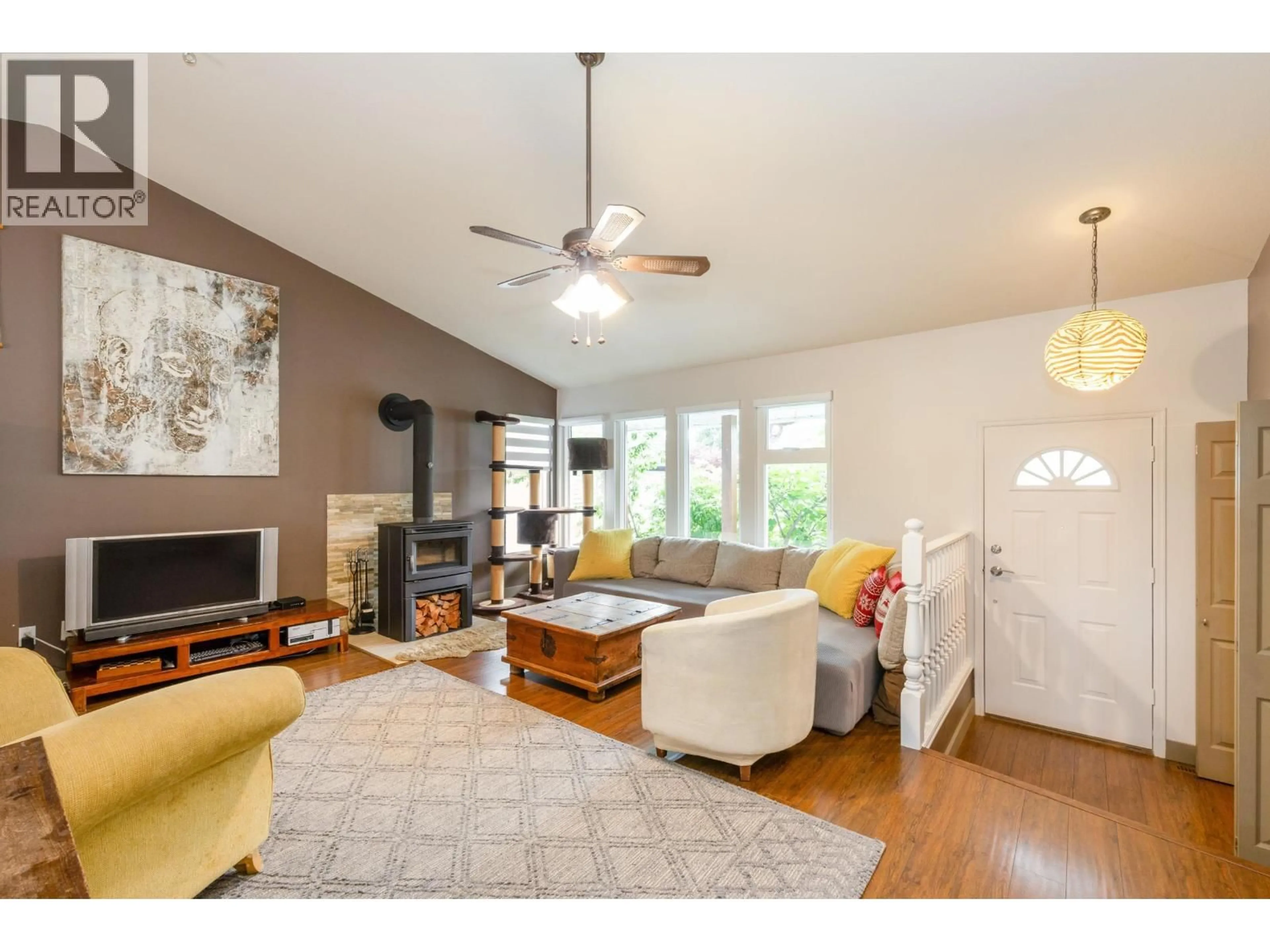 Living room with furniture, wood/laminate floor for 12193 MAKINSON STREET, Maple Ridge British Columbia V2X9P1