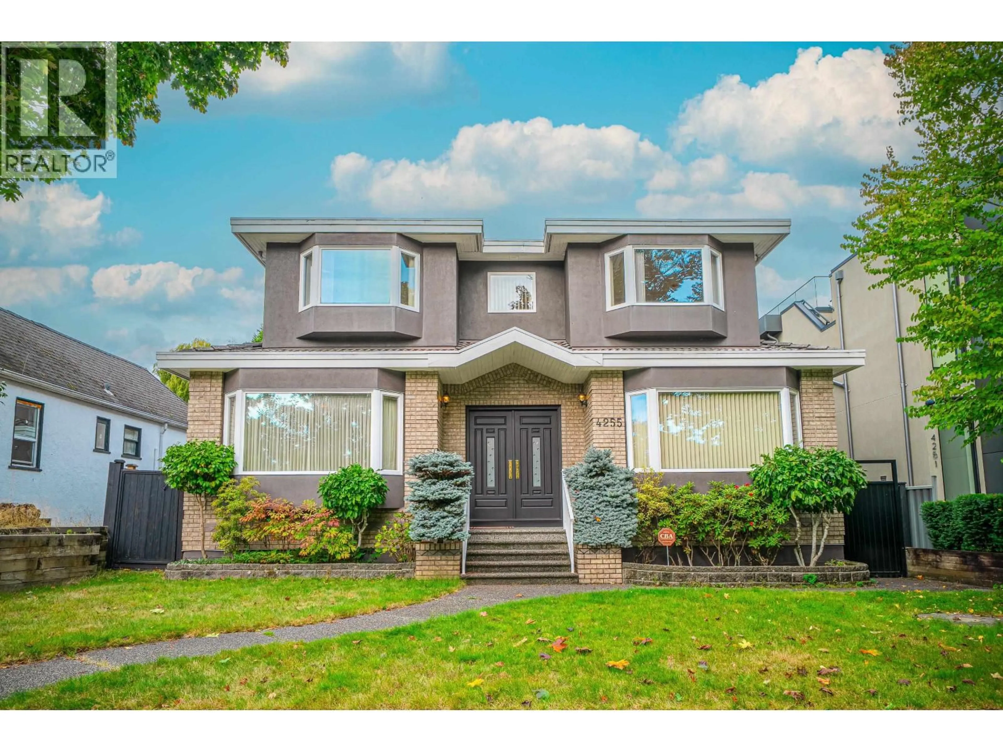 Home with vinyl exterior material, street for 4255 15TH AVENUE, Vancouver British Columbia V6R3A7