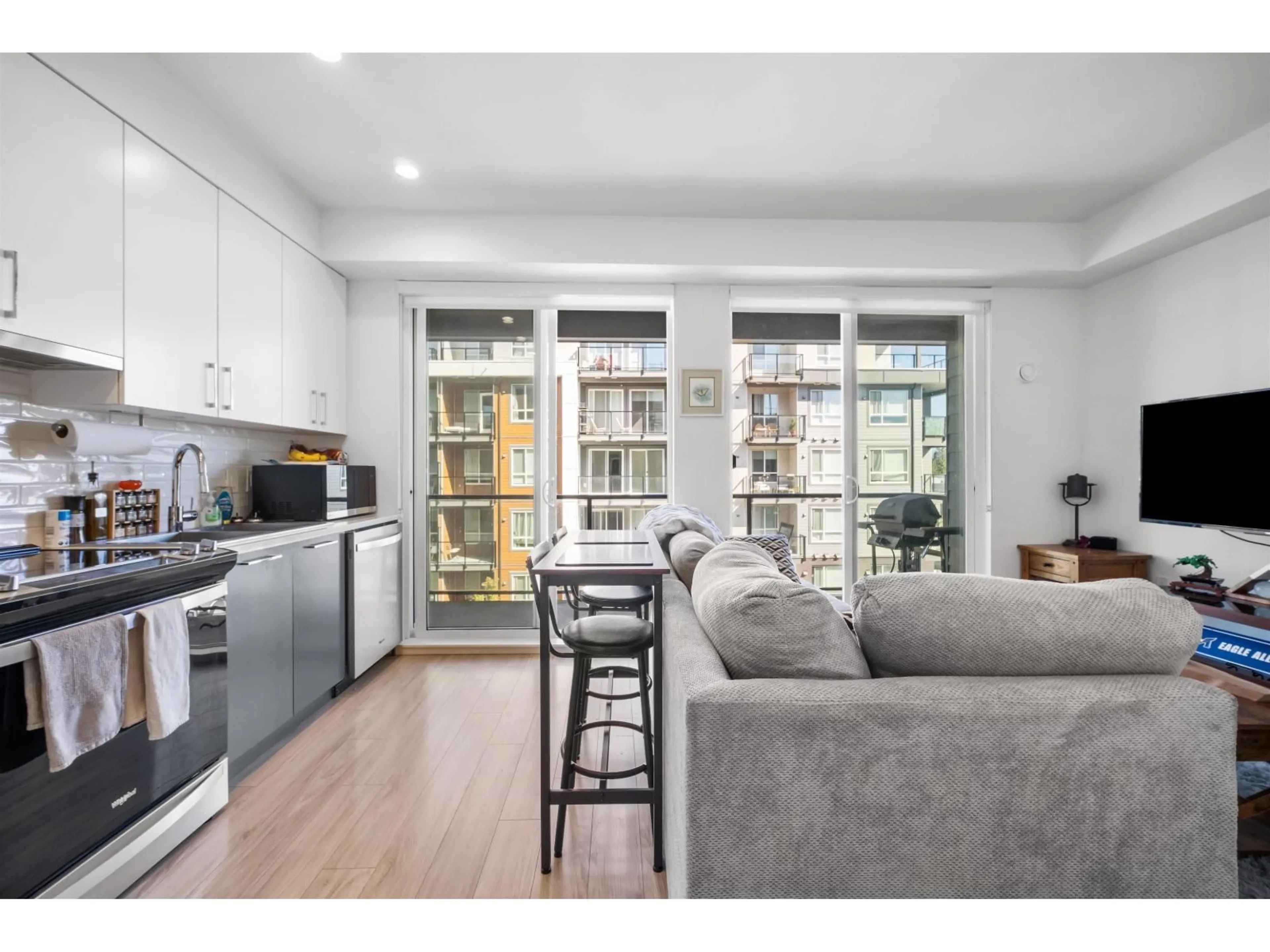 Open concept kitchen, wood/laminate floor for A413 - 20834 80 AVENUE, Langley British Columbia V2Y0Y6