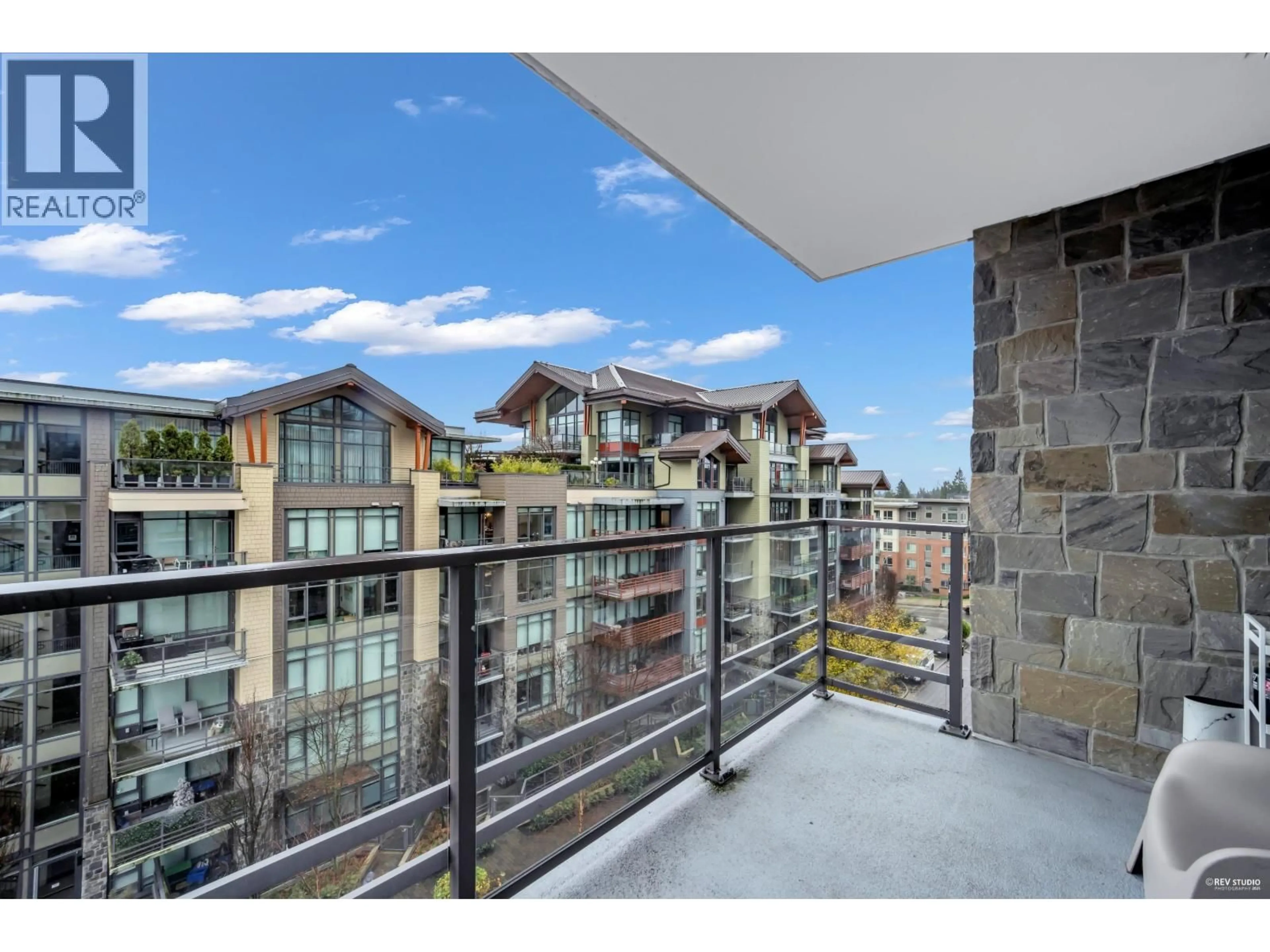 Balcony in the apartment, city buildings view from balcony for 405 - 2785 LIBRARY LANE, North Vancouver British Columbia V7J0C3