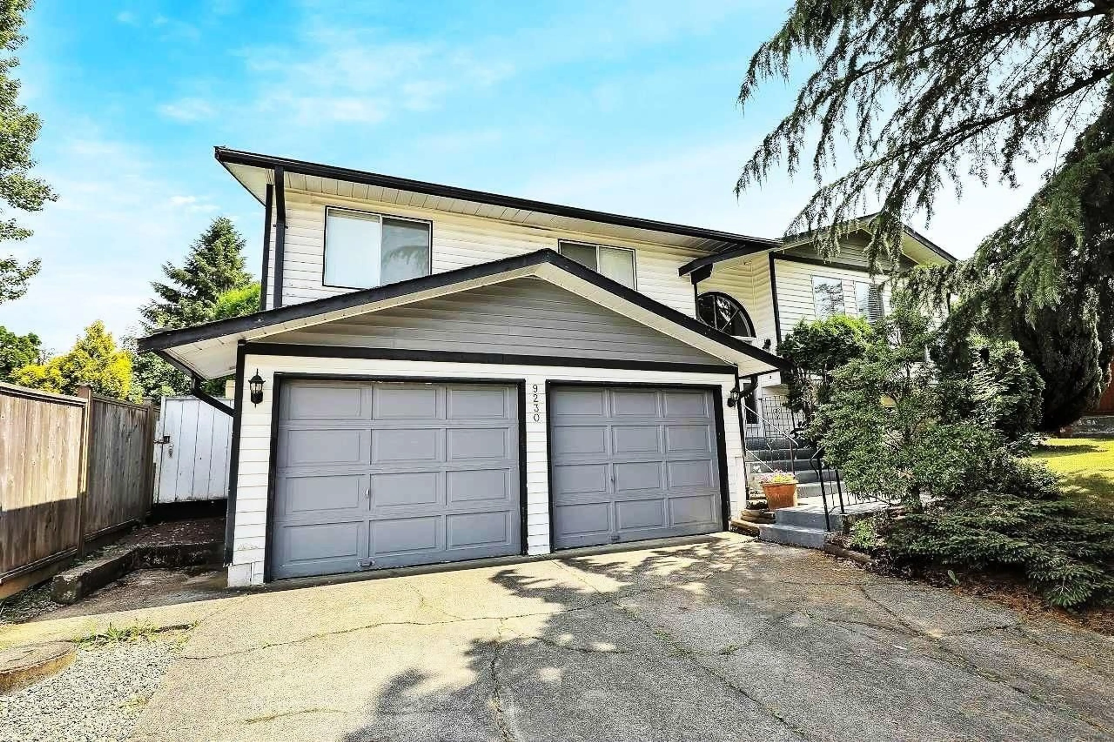 Home with vinyl exterior material, street for 9230 212B STREET, Langley British Columbia V1M1K9